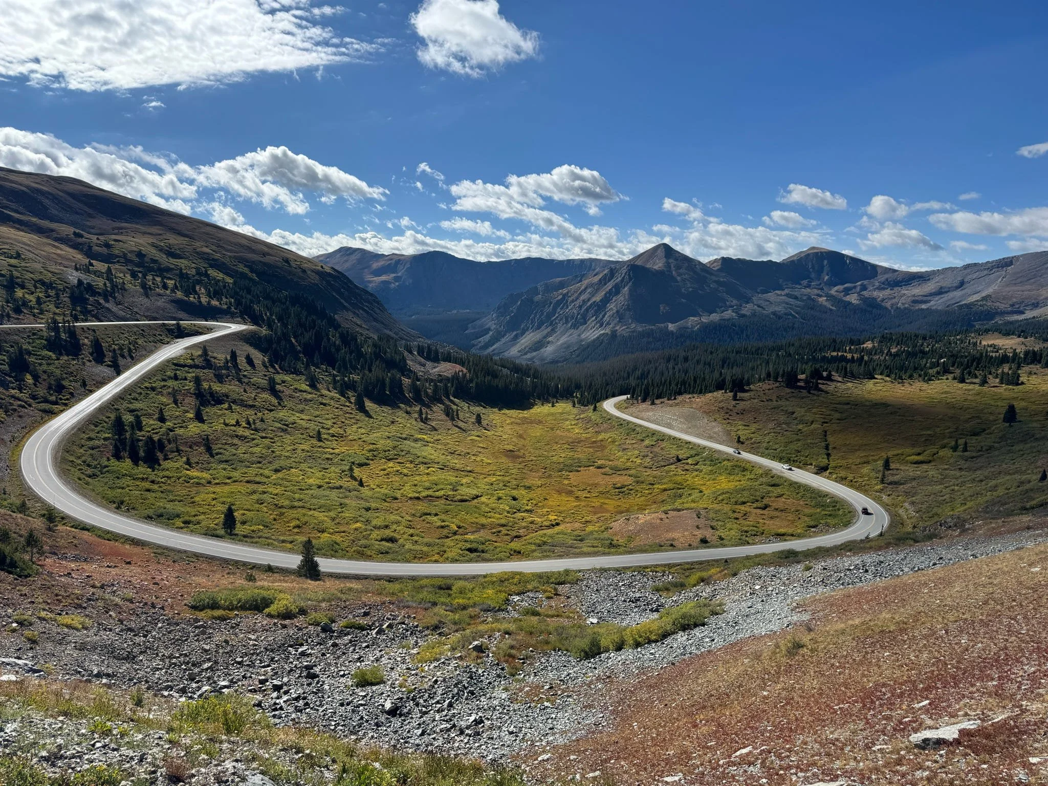 Colorado motorcycle tour riding through high mountain pass