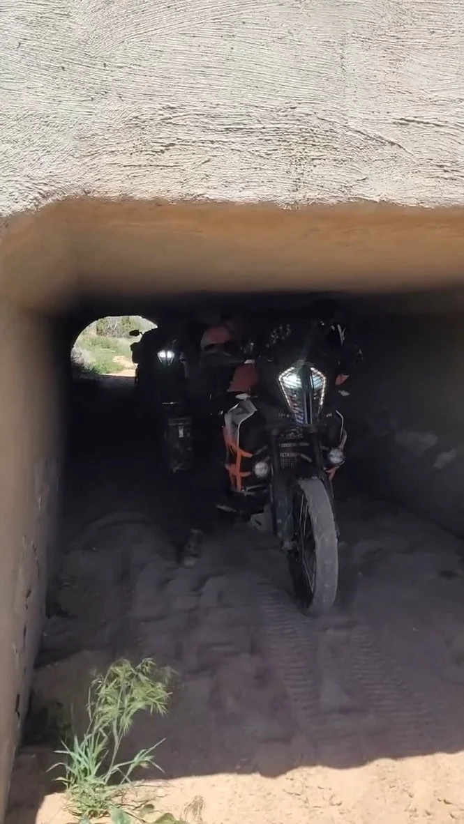 Utah motorcycle tour riding through red-rock desert terrain