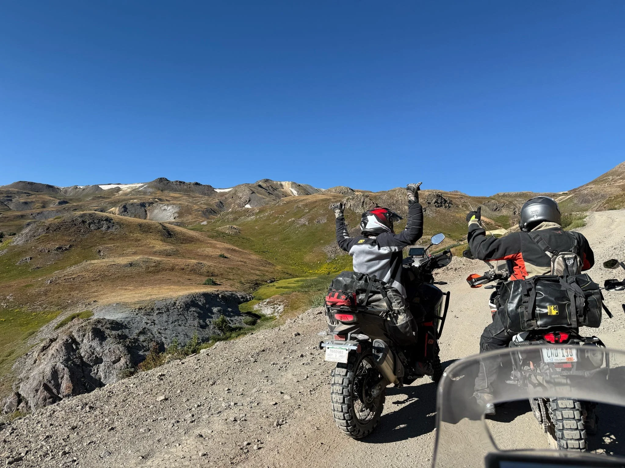 Colorado motorcycle tour riding through high mountain pass