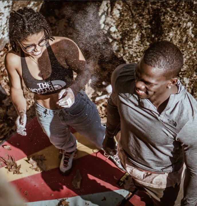 How has your Haitian identity and culture intersected with your love for the outdoors?