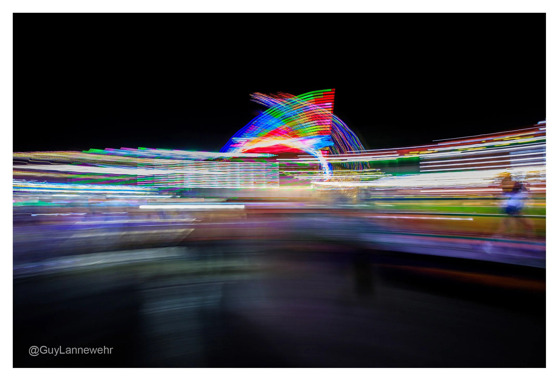 I felt a little "Artsy" last week at the Jefferson County Fair, which is only 2 blocks from my house, so...what the heck? Let's go.

Goal was to created long exposures of the Tilt-a-Puke and other vomit inducing human flinging machinery con