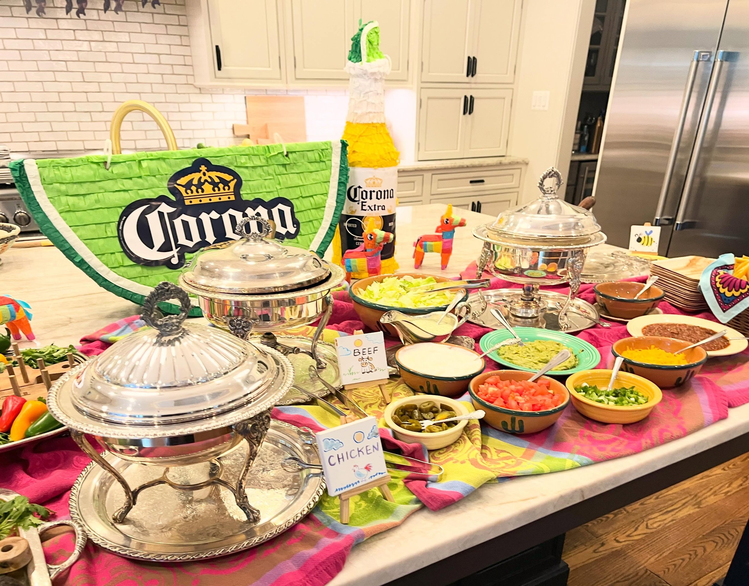 Cinco de Mayo was close to Mothers Day this past week so we were able to celebrate both with this taco and queso bar.  Fiestaware and vintage silver with a combination of pink and green. My kind of party!