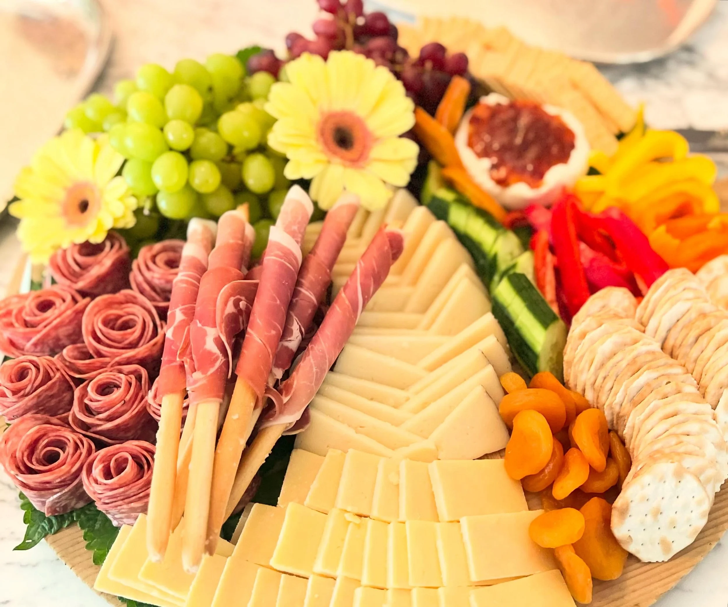 A bountiful bread board full of cheese and charcuterie at this weekend&rsquo;s graduation party.  We love this season of young adults celebrating the milestone of high school graduation and the parents cheering them on. Always such special gatherings