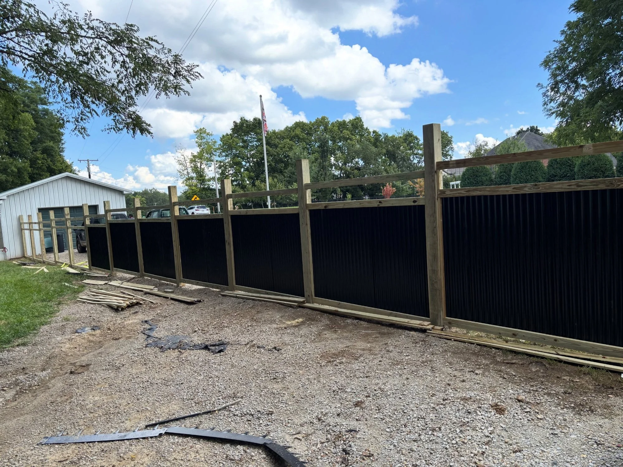 Custom Wood Frame Fence with Black Panels