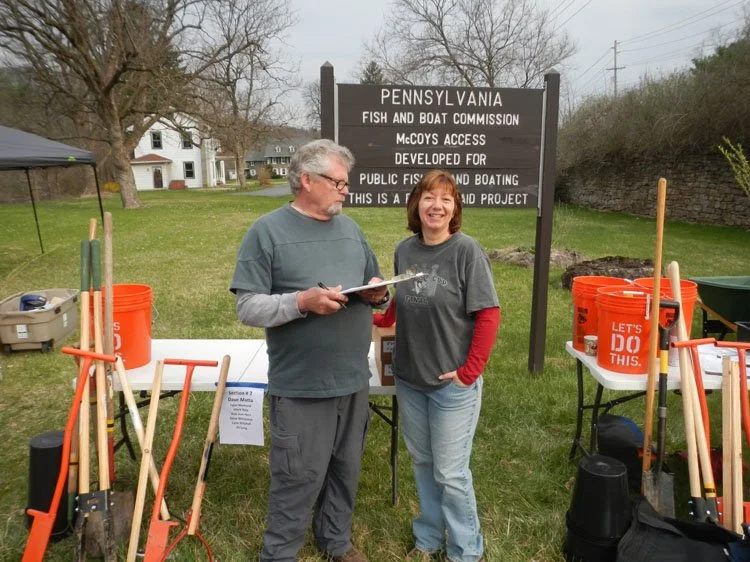 Bob & Paula checking lists.jpg