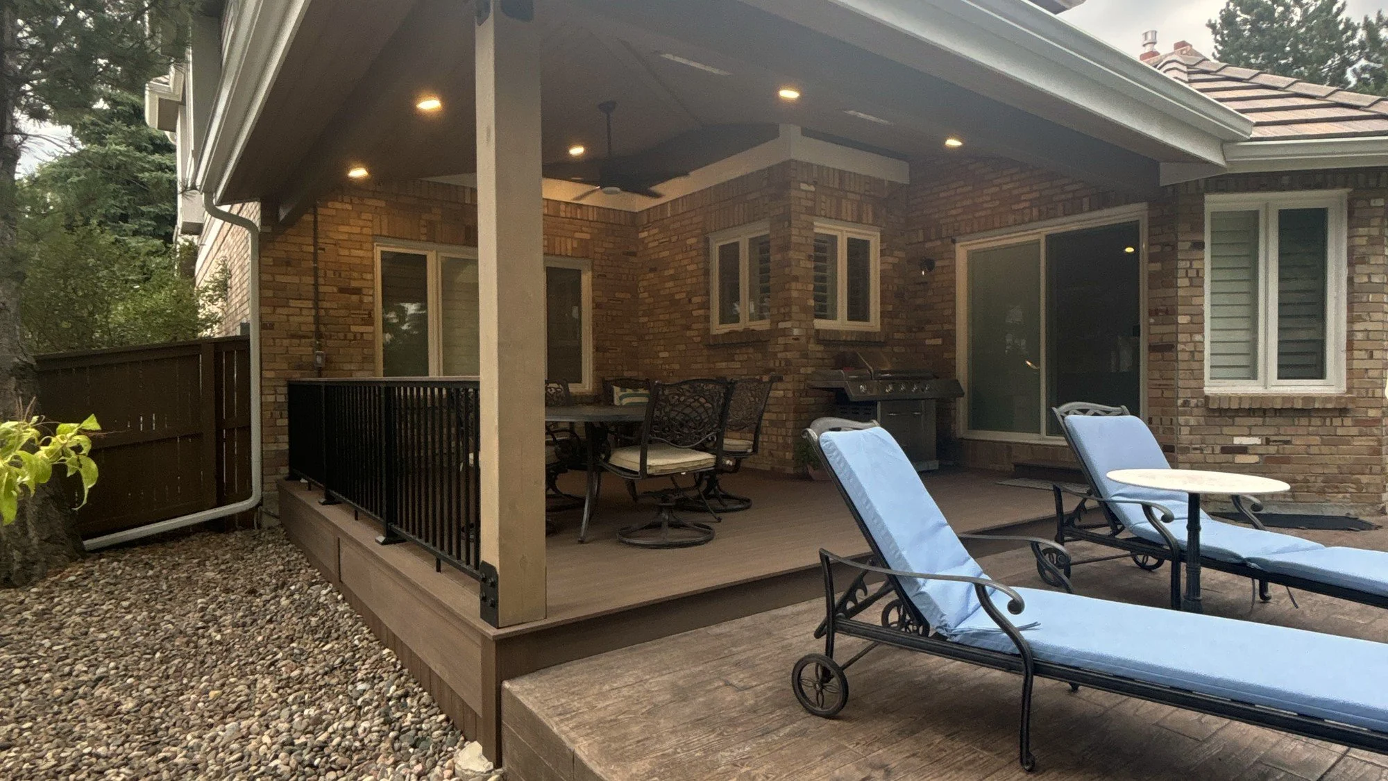 atio cover with an adjoining open lounge area at a Colorado home