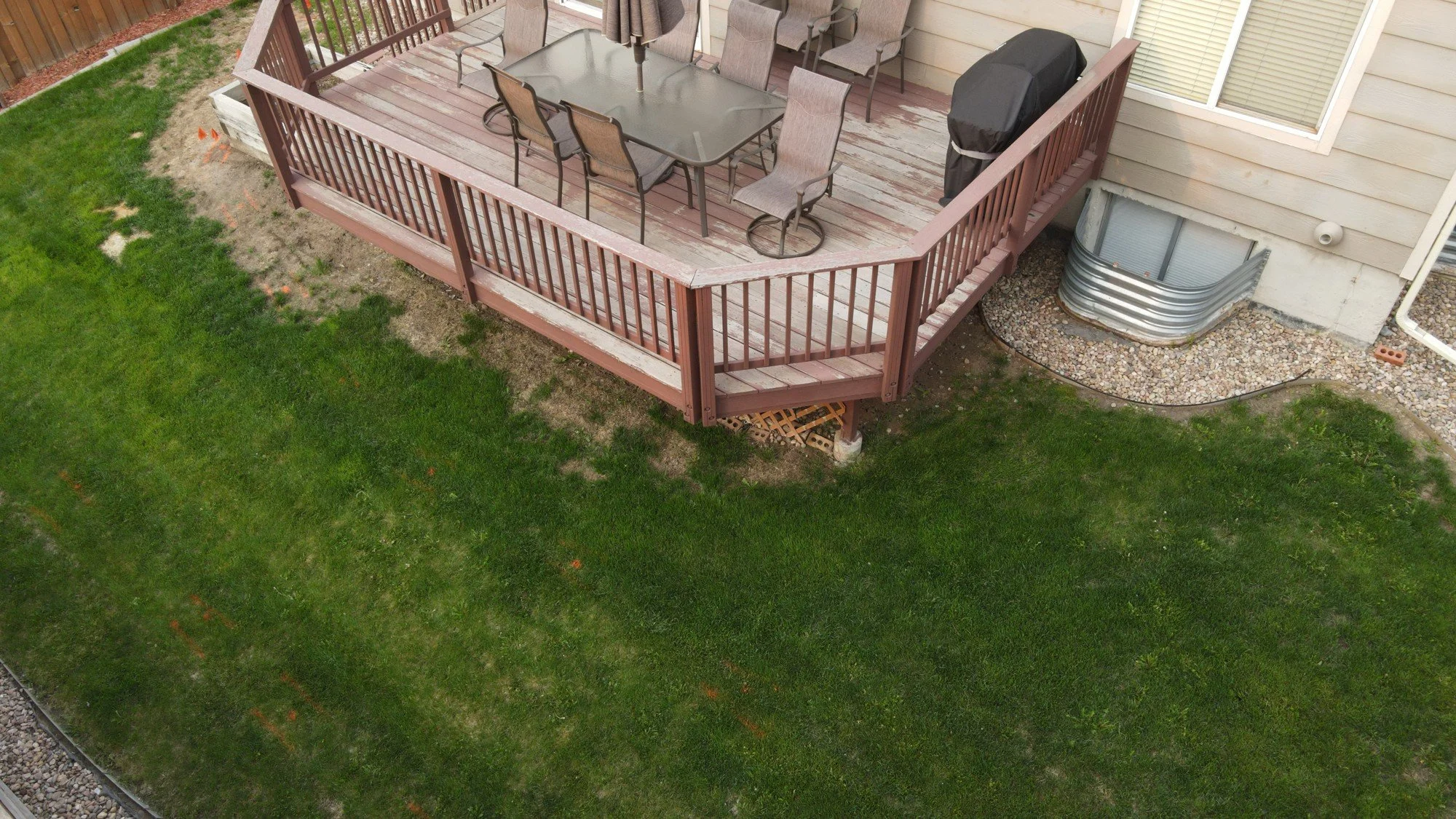 Aging wood deck before replacement at a Morrison, Colorado home