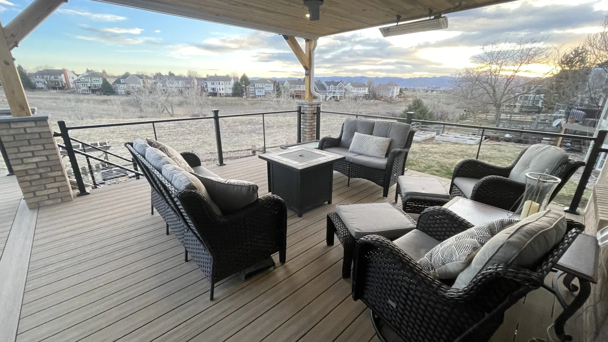 Covered deck with fire table and open Front Range views, Colorado