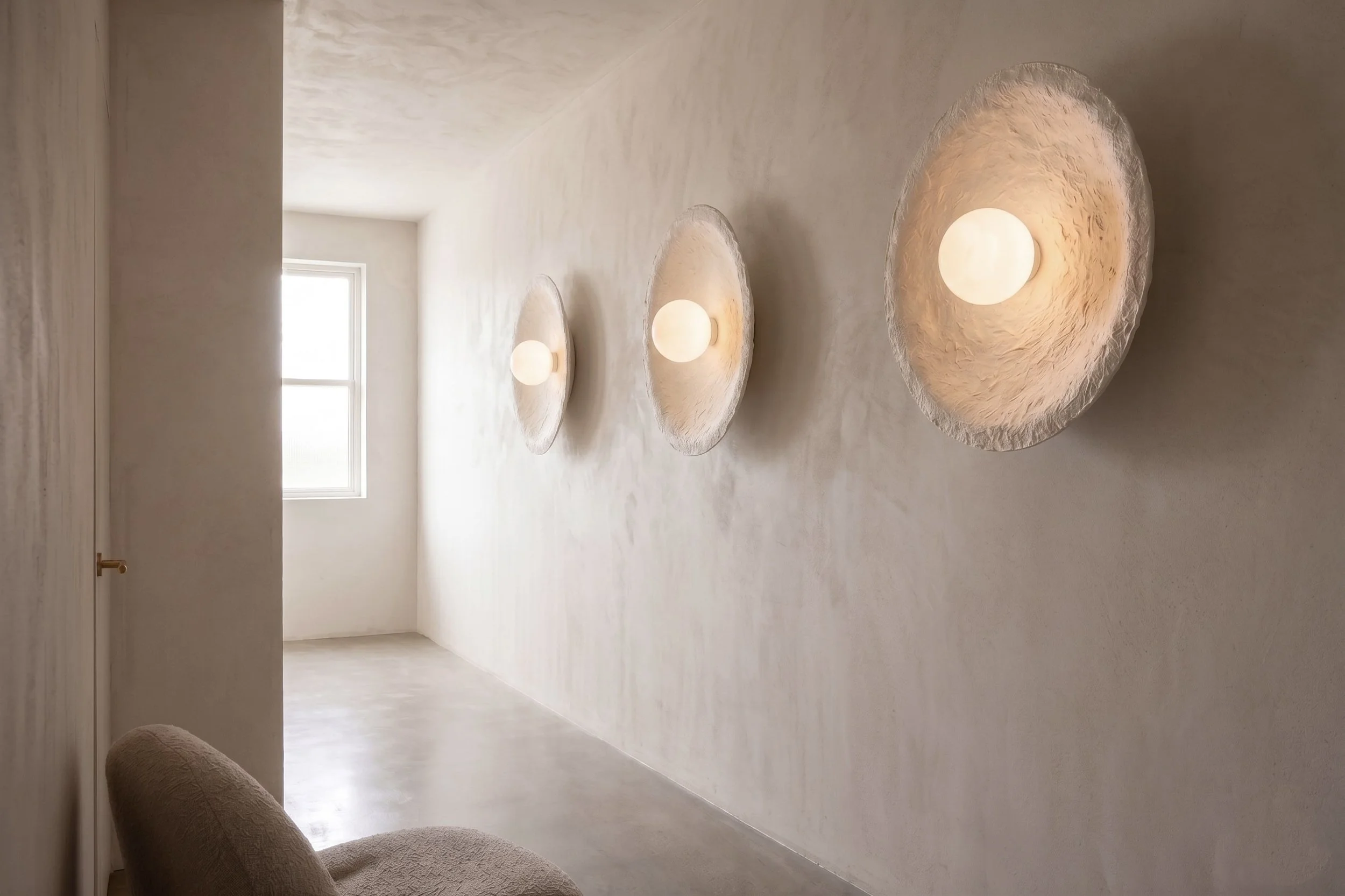 Disc-Sconces-in-Hallway.jpg