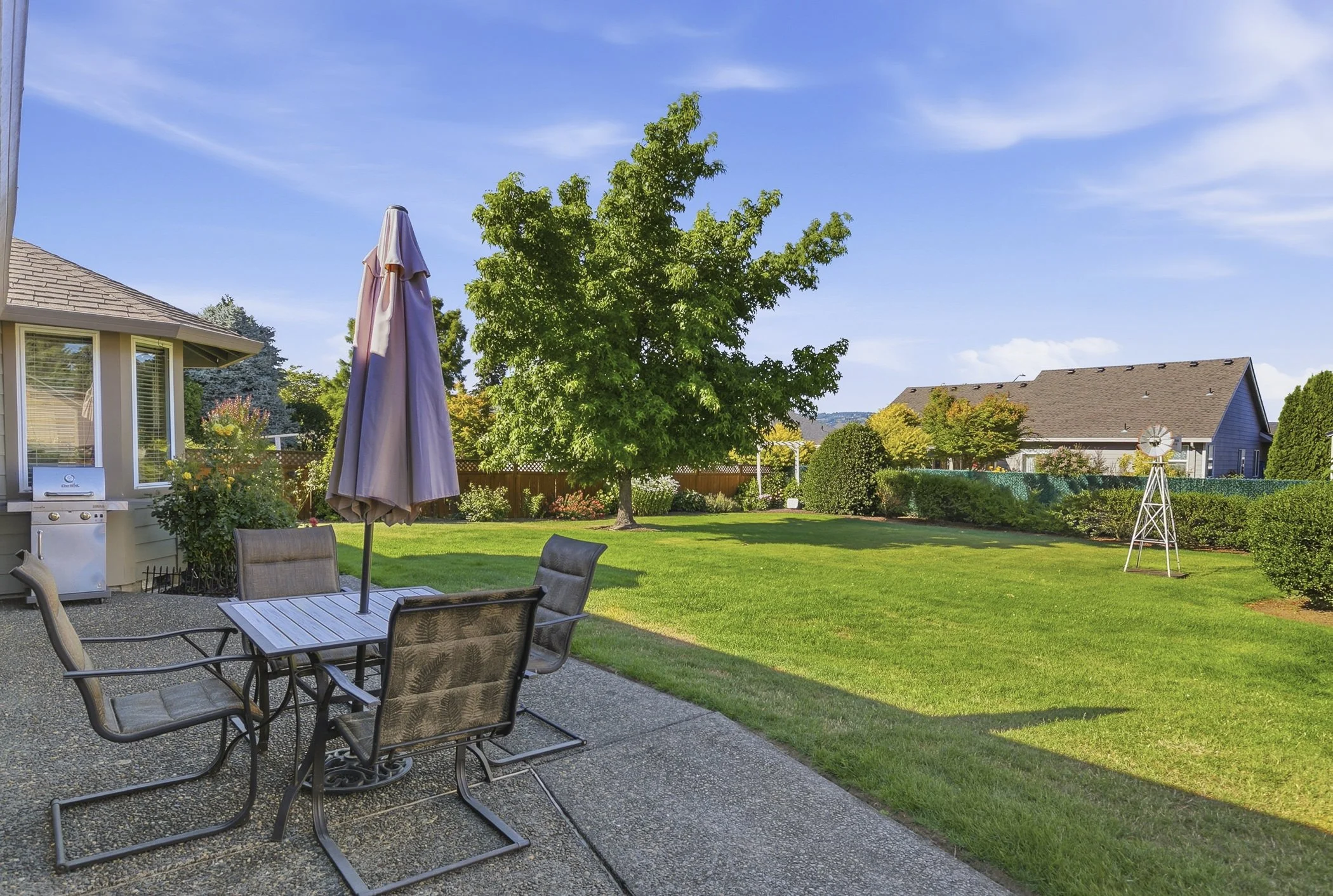 Backyard view of a home in Columbia City, OR