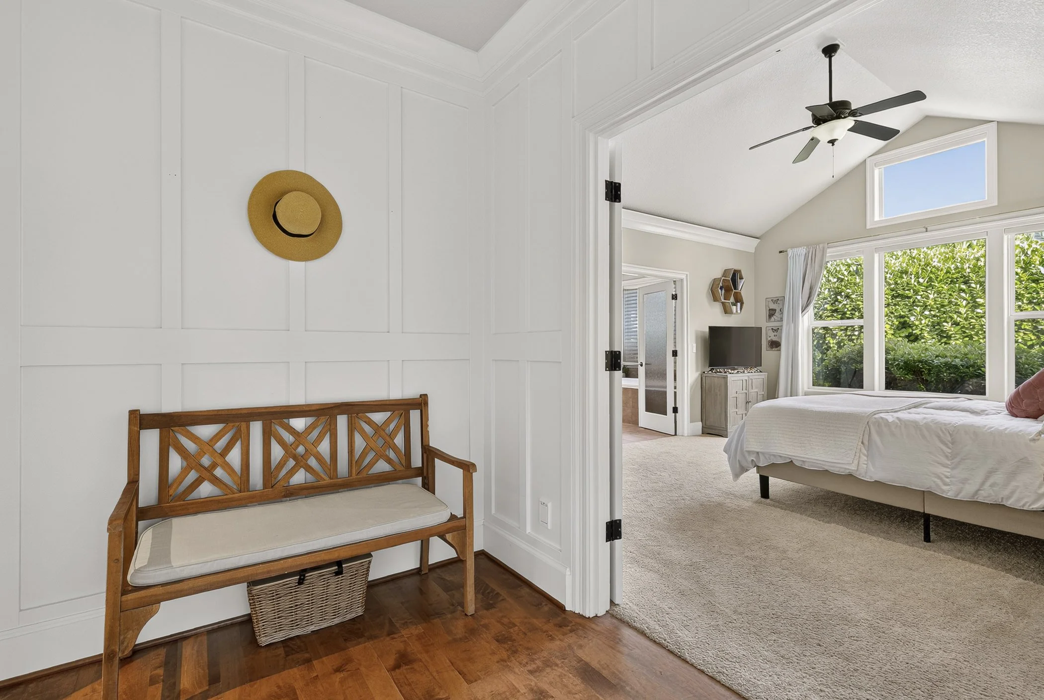 View of a sitting area that leads into the primary bedroom in a luxury home in Vancouver, WA
