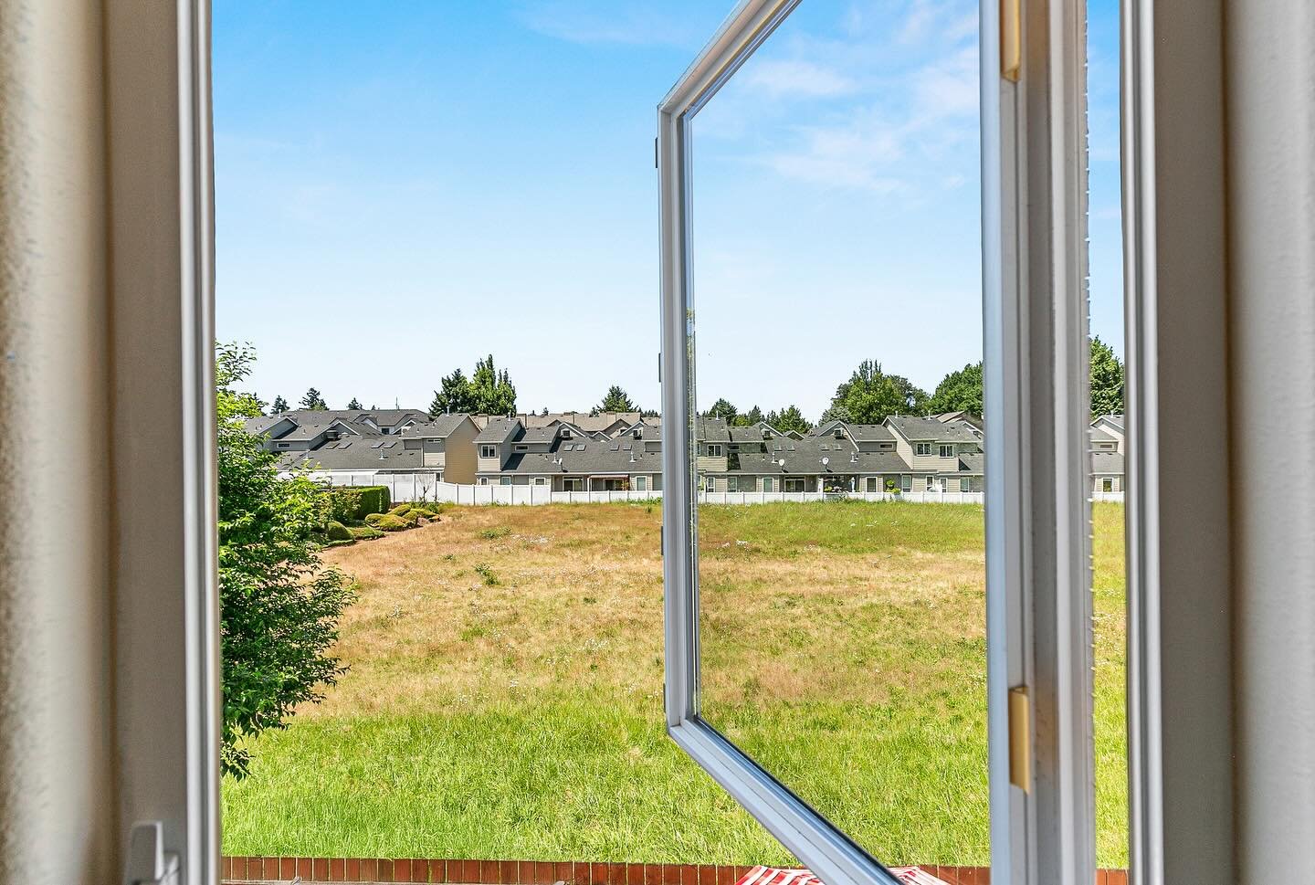 I seized the opportunity to capture a less traditional real estate photo appreciating all the metaphorical references it suggests.

A window of opportunity to own your first home. Looking out into the future of all the memories that will be created i