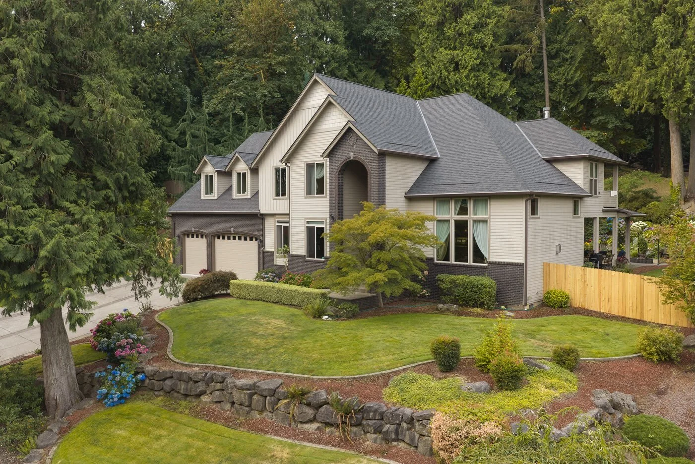 Luxury living in Vancouver, WA.

Perfectly positioned custom home on a private road delivering serious space, quality, and flexibility. Soaring ceilings, oversized doors, and wood floors welcome you into this secluded masterpiece. Brand new roof and 
