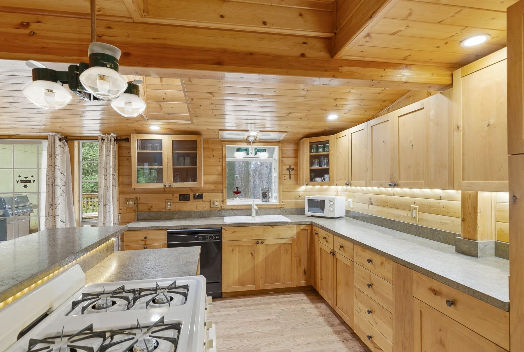 Rustic kitchen located in Northwoods in Cougar, WA