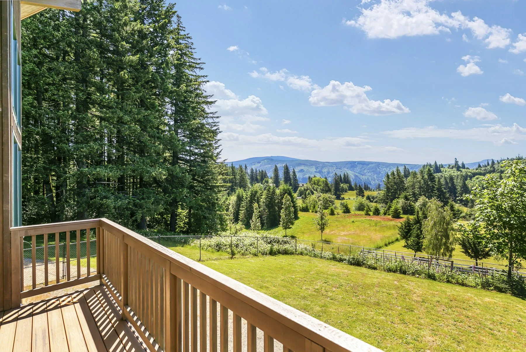 Scenic view from the back deck of a Contemporary lodge-style home in Washougal, WA