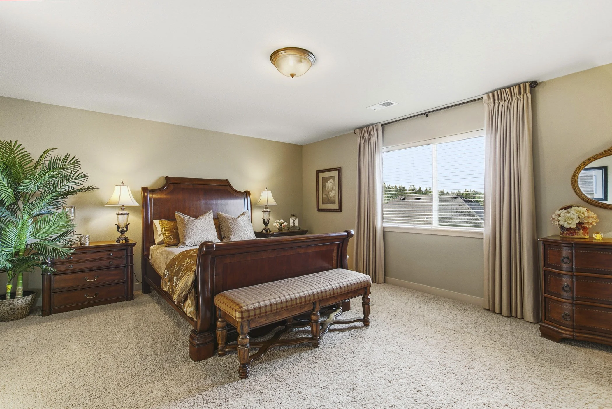Primary bedroom in a home located in Portland, Oregon photographed by real estate photographer Paul Rich Studio