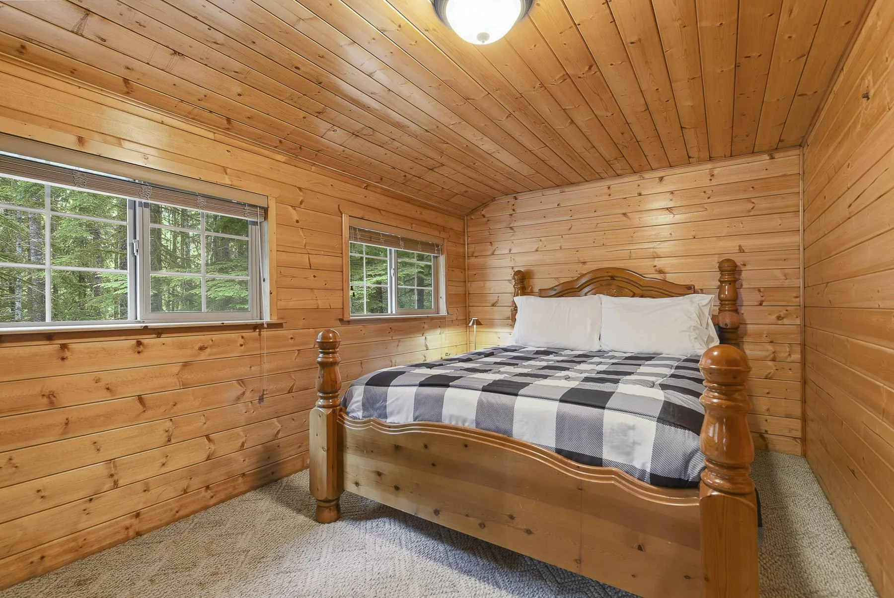 Interior photo of a bedroom in a rustic cabin in Northwoods
