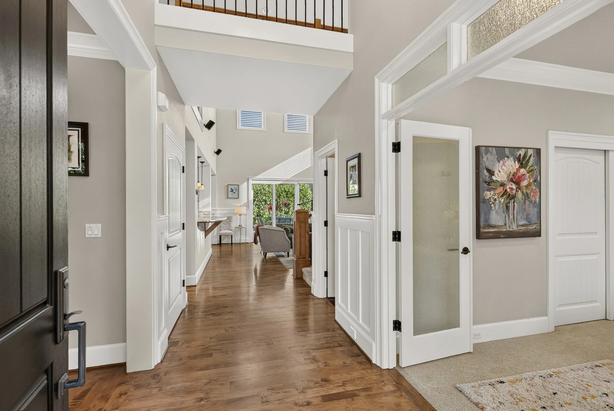 Open front door view peering into a luxury home in Vancouver, WA