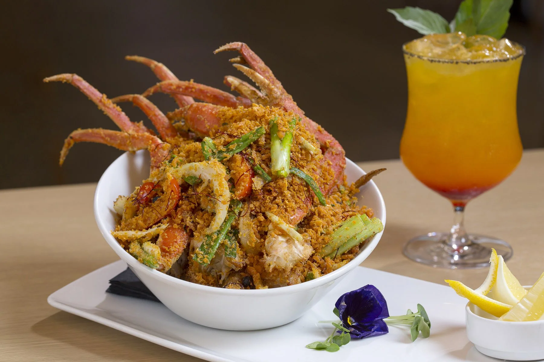 Wild tropical presentation of a crab fried rice dish beautifully presented and captured by local food photographer Paul Rich Studio