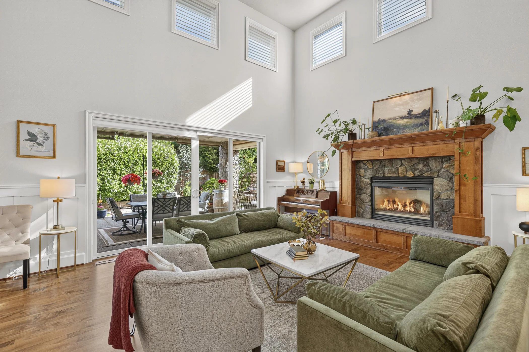 Living room area with a beautiful fireplace in a luxury home in Vancouver, WA