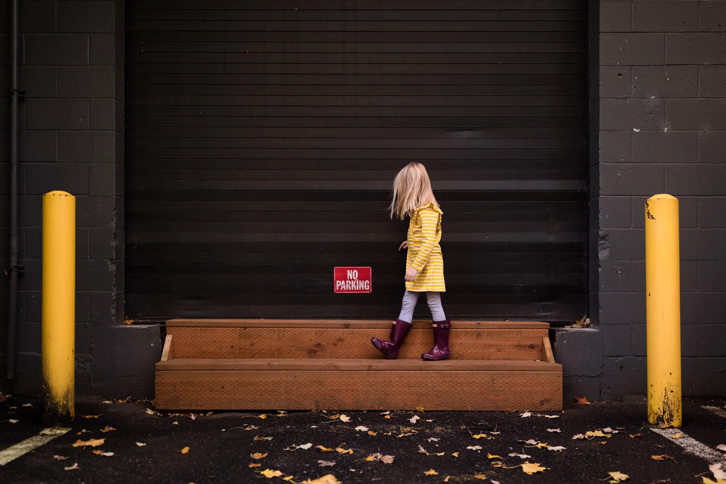 girl in yellow dress explores pearl district in portland