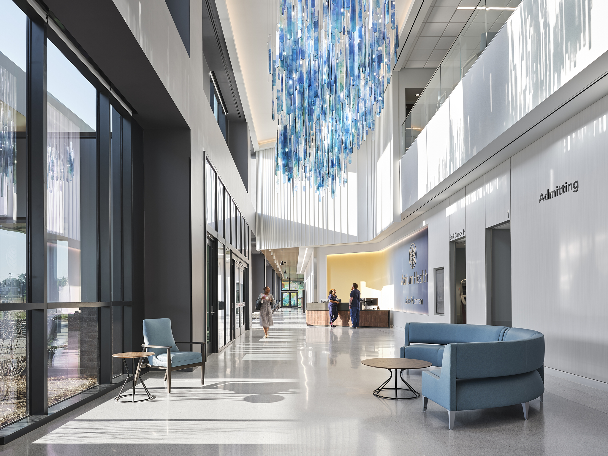 Lake Norman Hospital Main Lobby, featuring evidence based design and cutting edge technology. The Hospital is designed by NBBJ Architects and captured by architectural photographer, Nick McGinn of McGinn Photography