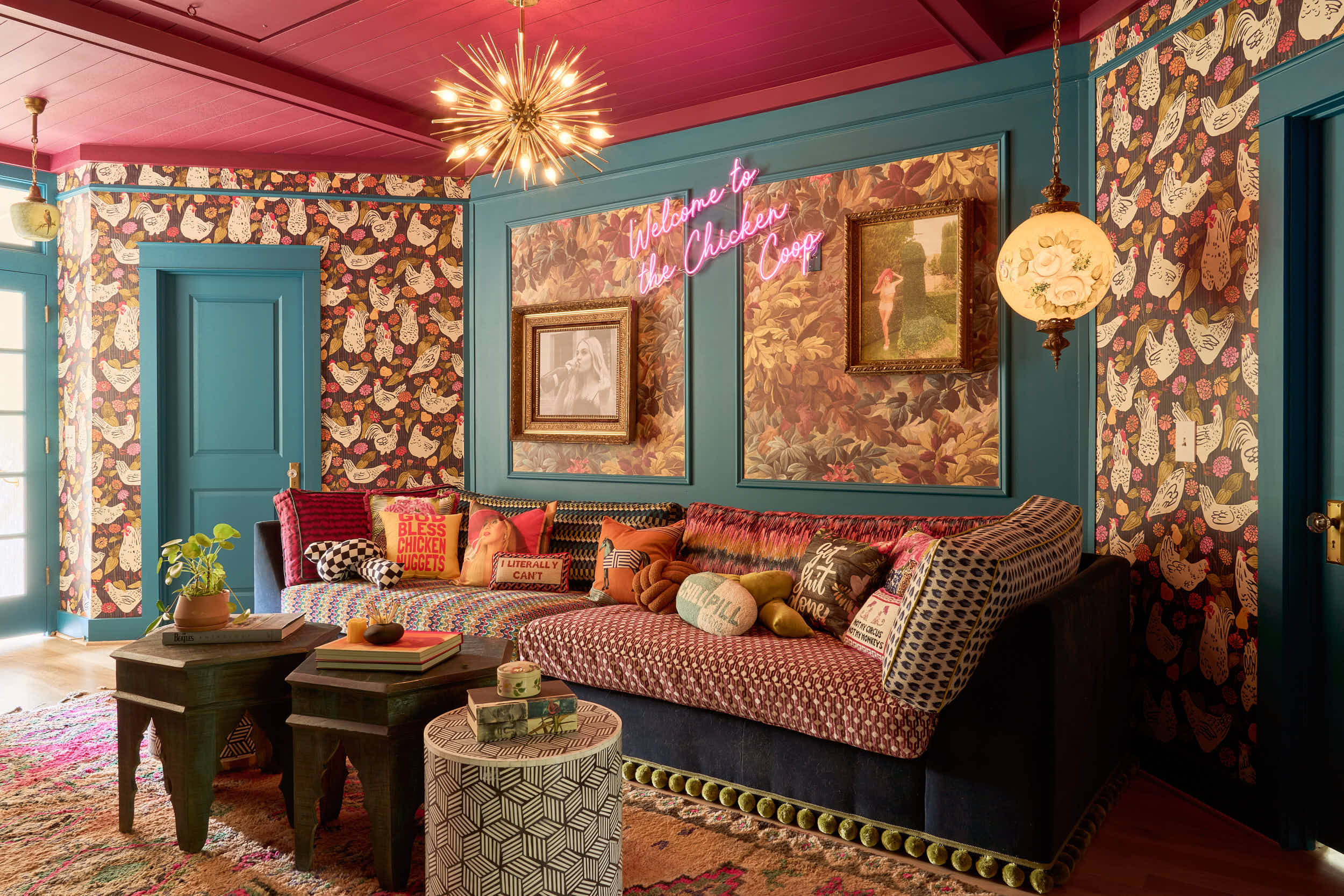 This vibrant lounge area in a Nashville private estate is a masterclass in maximalist interior design. Photographed for Branan White Interior Design, the space, known as "The Chicken Coop," features a bold juxtaposition of patterns and textures. From