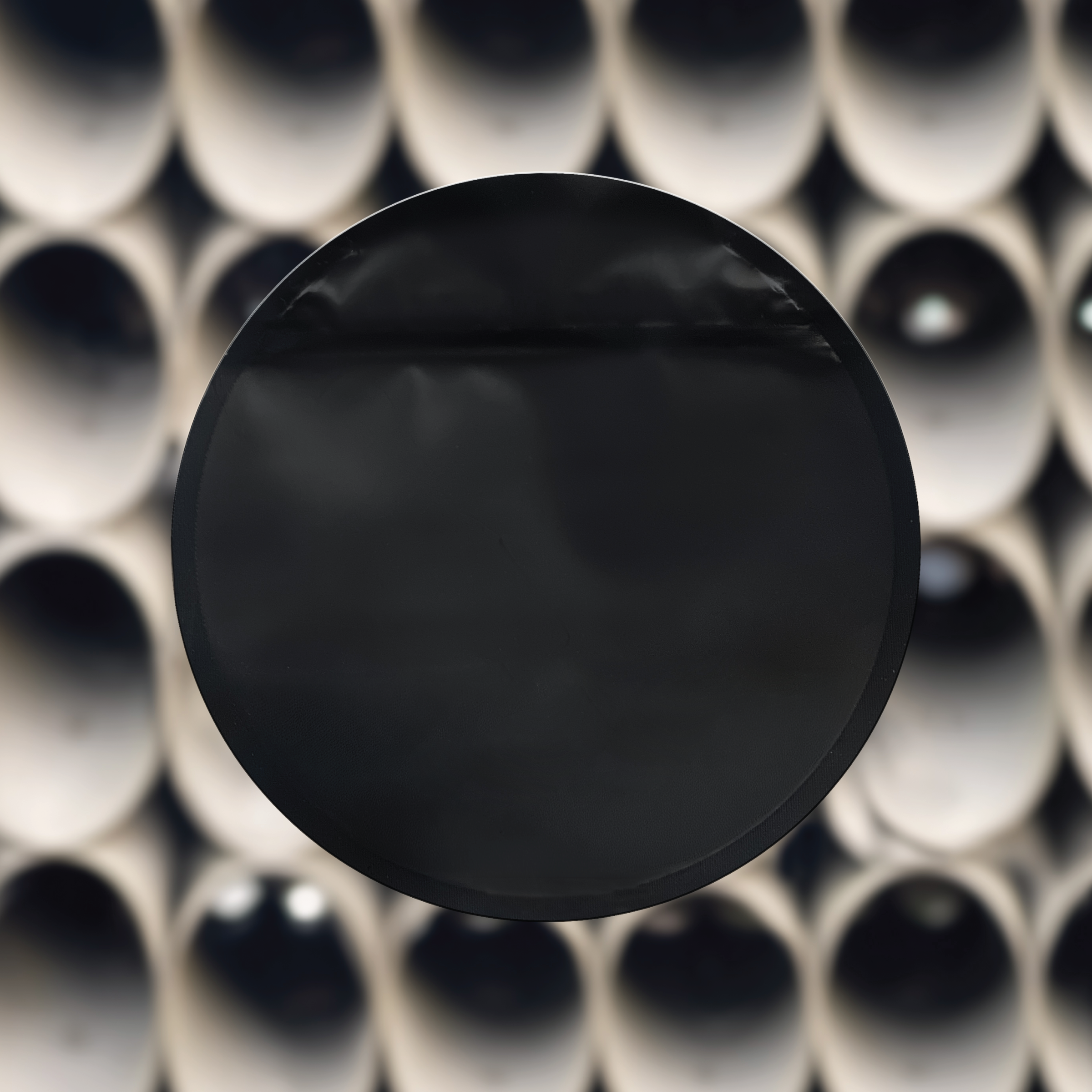 Black circle bag on an outdoor surface