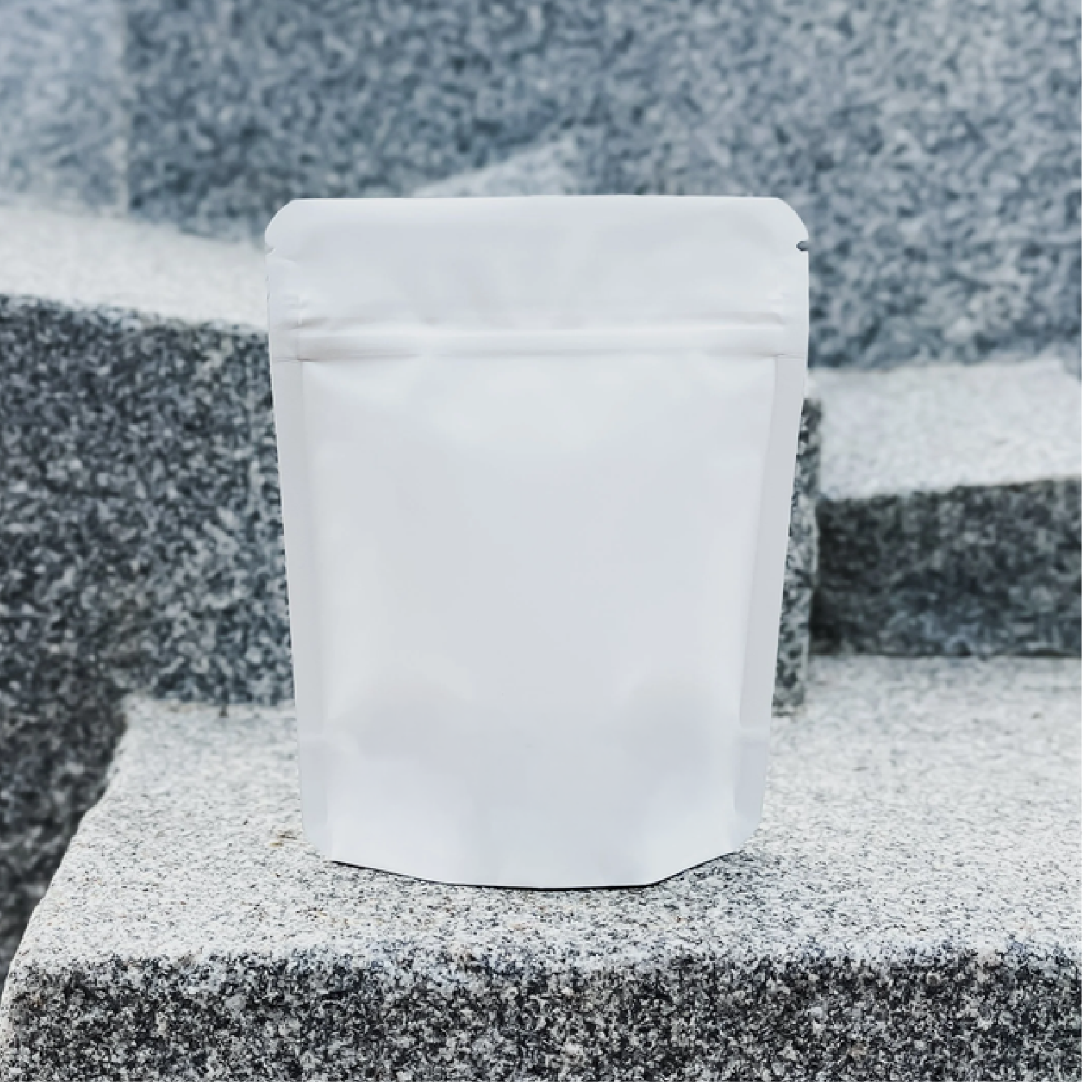 White 4x5in Bag on stone podium