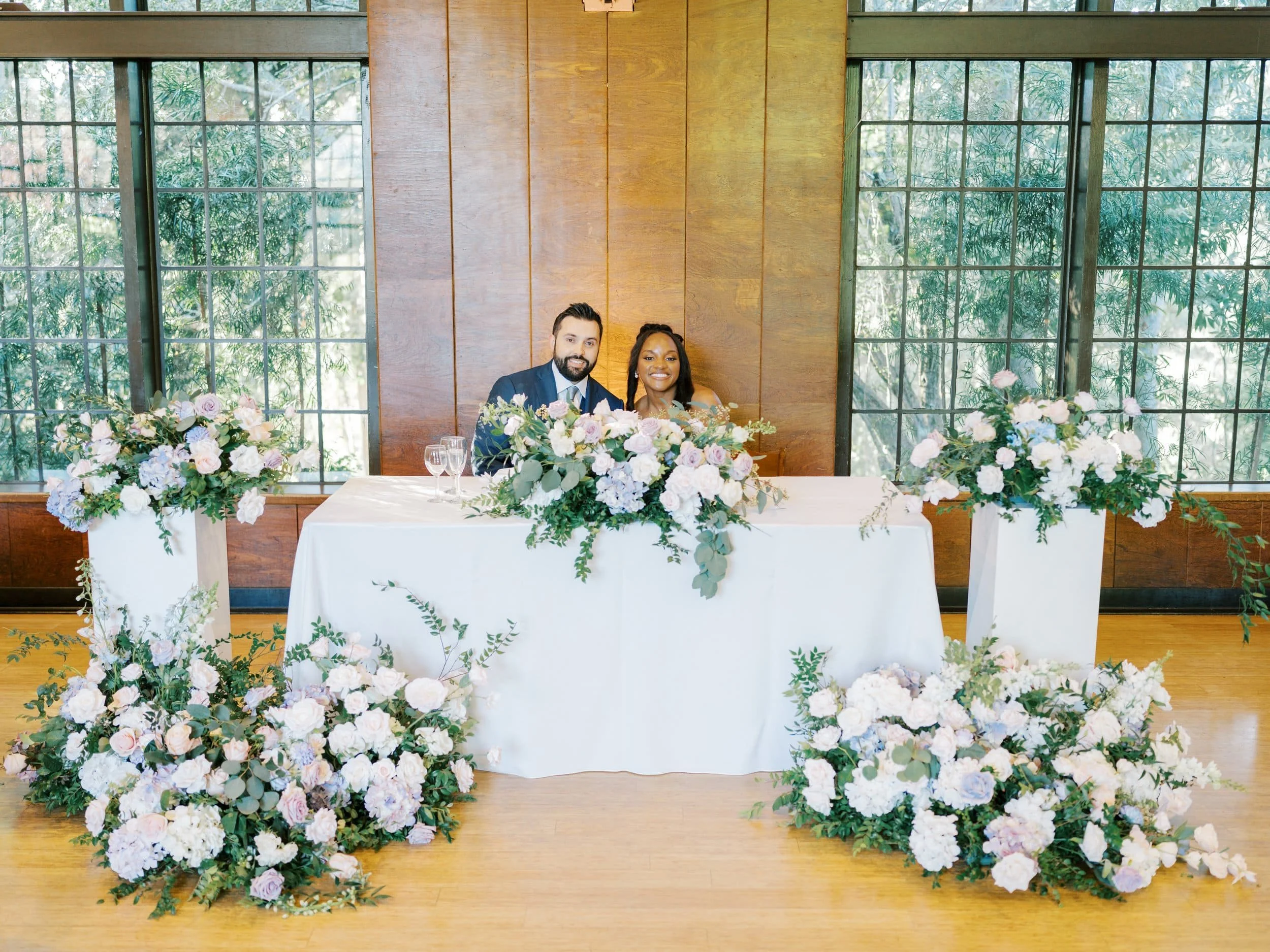 Soft pastel hues of blush, lavender, and cream set a romantic tone for Josten & Connor’s wedding at the Brazilian Room. Elegant roses and delicate anemones were paired with lush greenery, creating exquisite bouquets and dreamy floral arrangements tha