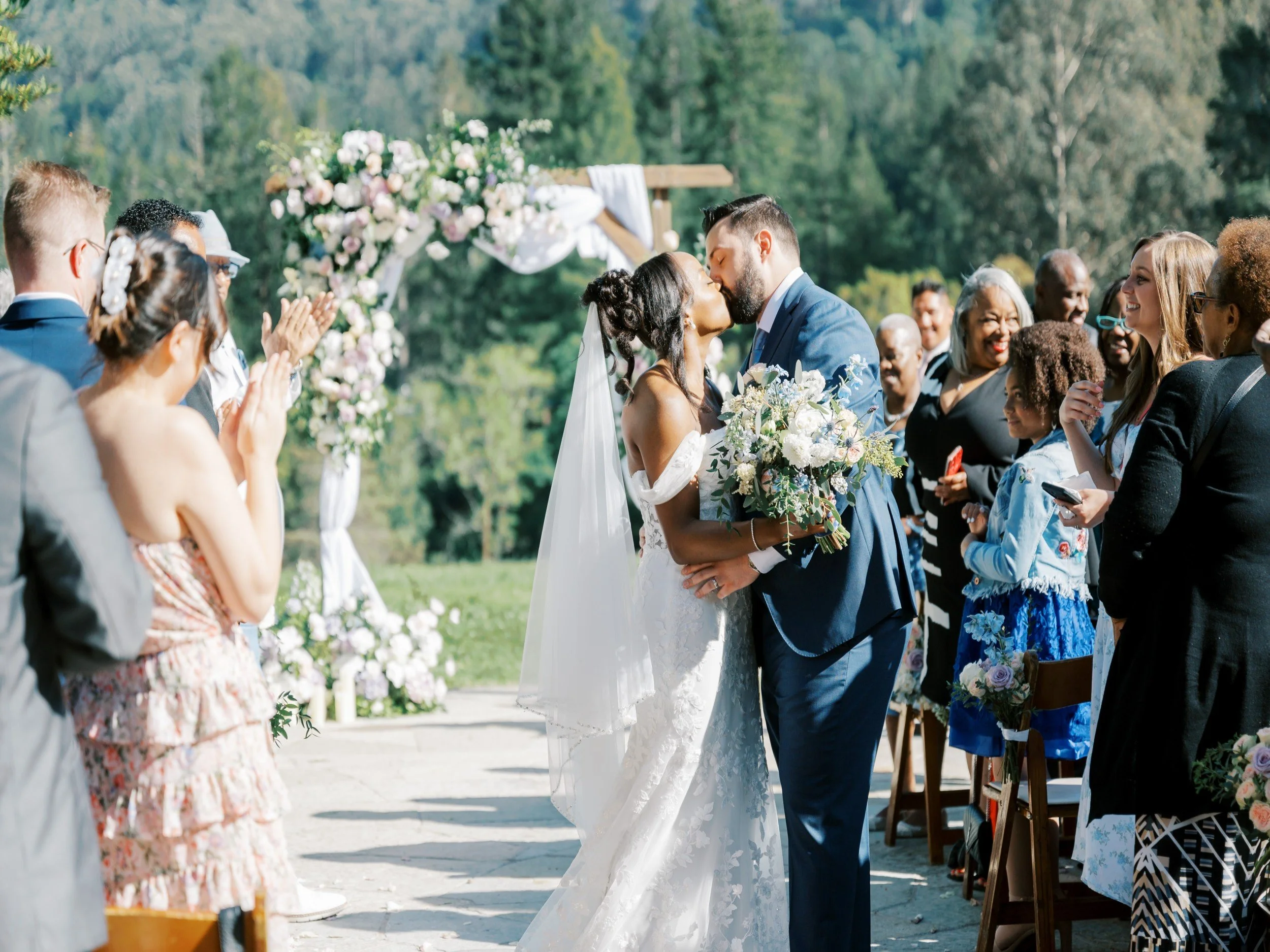 Soft pastel hues of blush, lavender, and cream set a romantic tone for Josten & Connor’s wedding at the Brazilian Room. Elegant roses and delicate anemones were paired with lush greenery, creating exquisite bouquets and dreamy floral arrangements tha