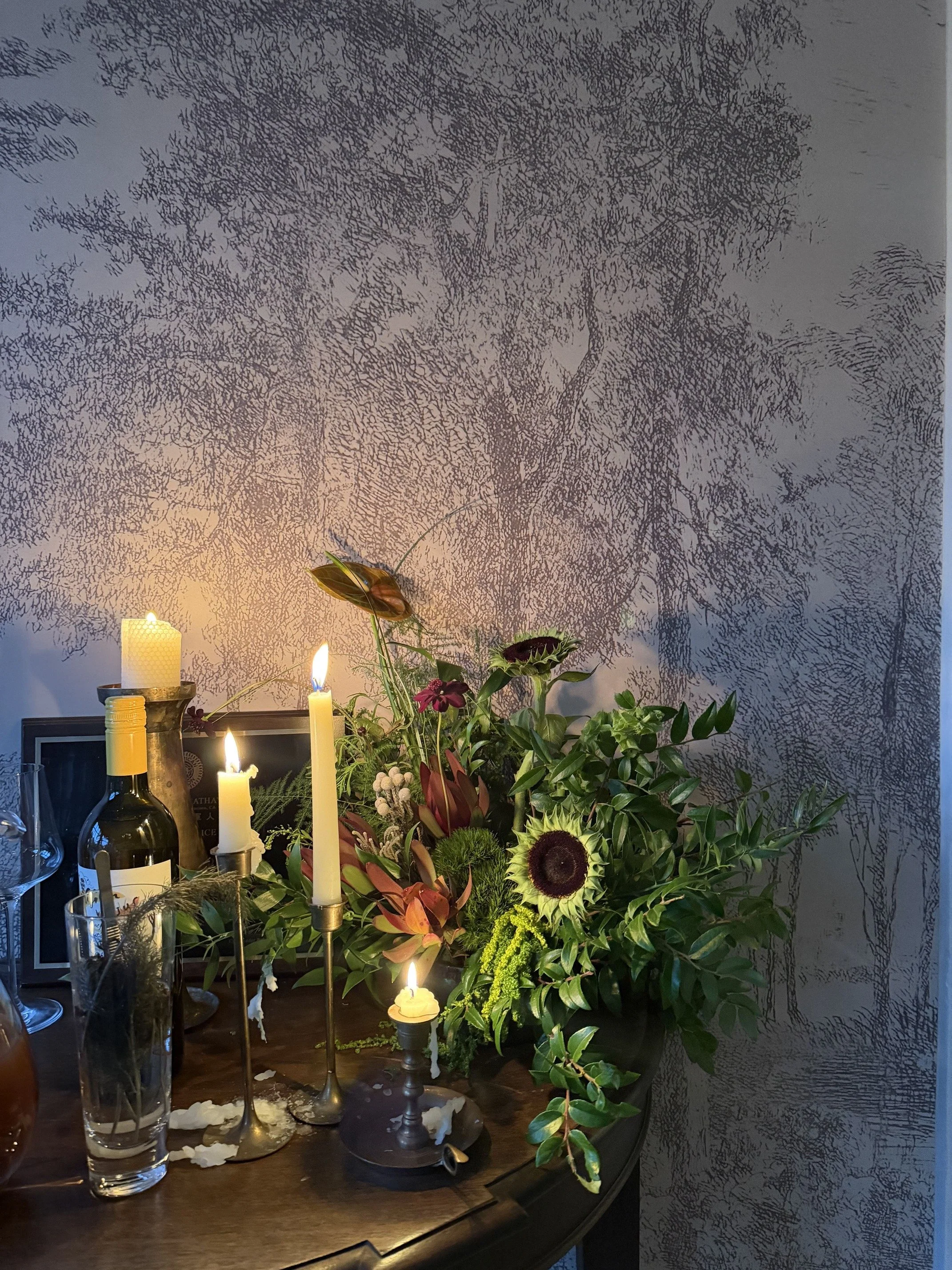 Contemporary corporate event floral design for Methodology, featuring artistic, sculptural arrangements with lush greenery, premium blooms, and unexpected botanical elements. A modern, organic, garden-inspired approach to corporate event florals in S