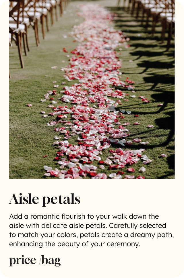 A wedding aisle lined with delicate red and white flower petals, creating a romantic and dreamy path for the ceremony.