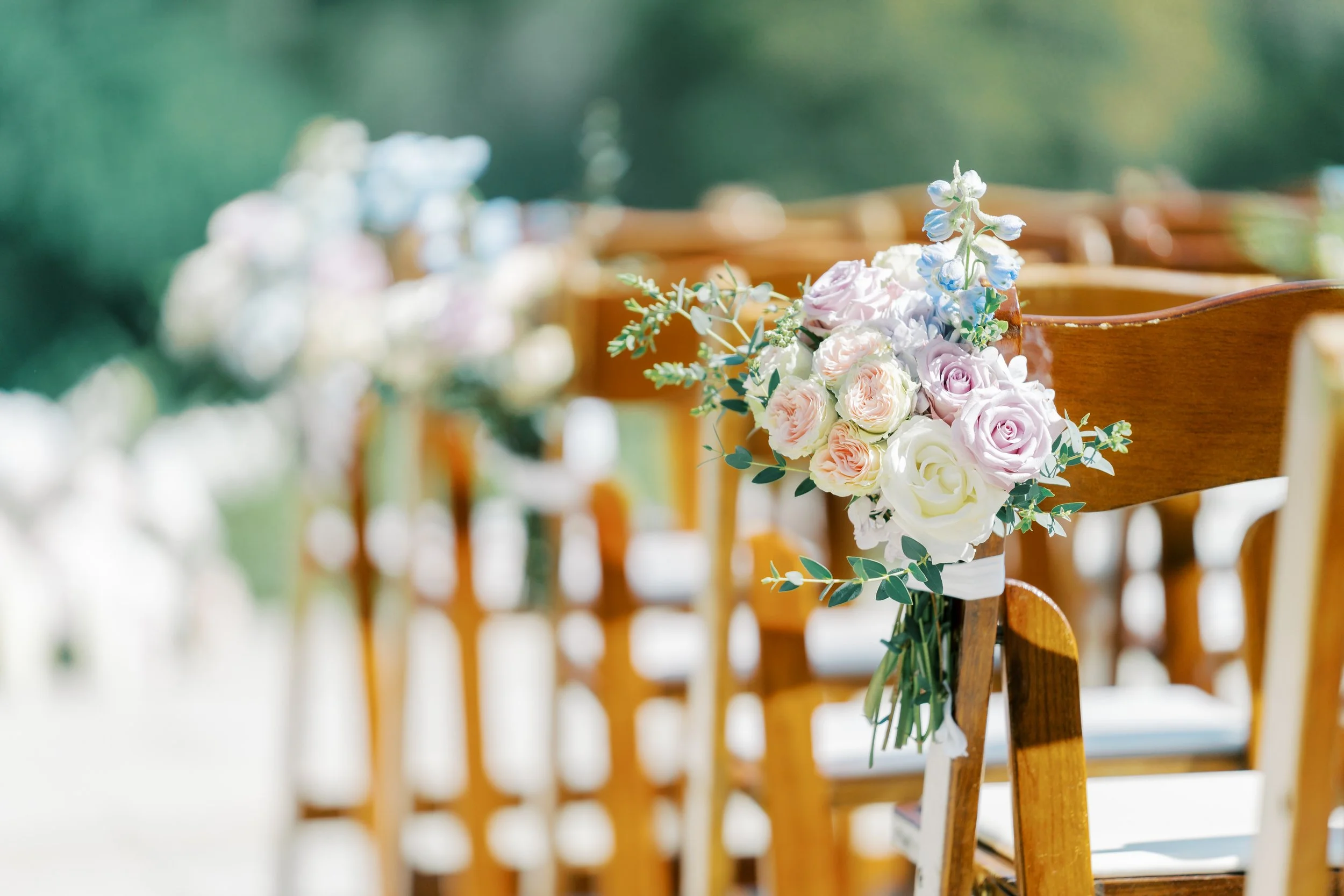 Soft pastel hues of blush, lavender, and cream set a romantic tone for Josten & Connor’s wedding at the Brazilian Room. Elegant roses and delicate anemones were paired with lush greenery, creating exquisite bouquets and dreamy floral arrangements tha