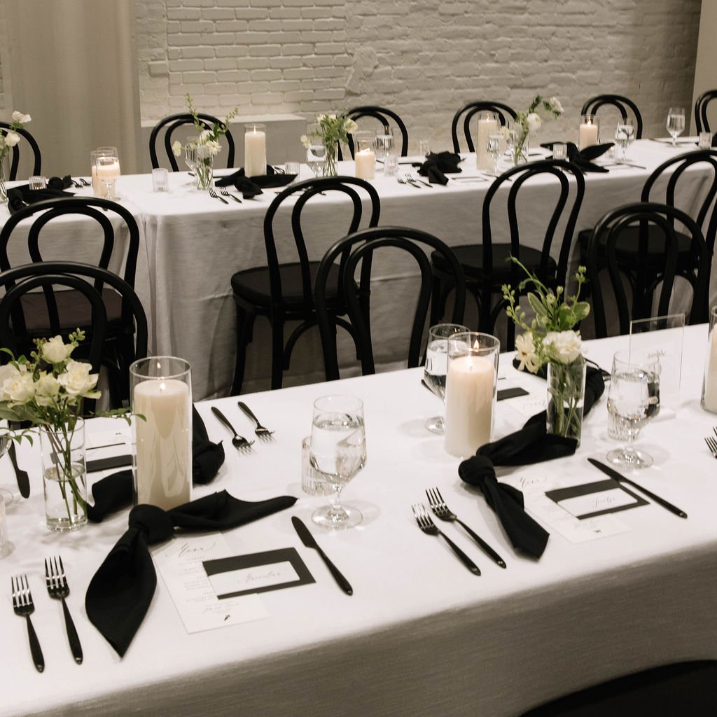 An elegant all-white palette transformed Blanco Urban Venue into a chic urban oasis for Bianca & John’s wedding. Lush roses, towering delphiniums, and touches of soft greenery lined the aisle, creating a bright, modern pathway toward the fireplace al