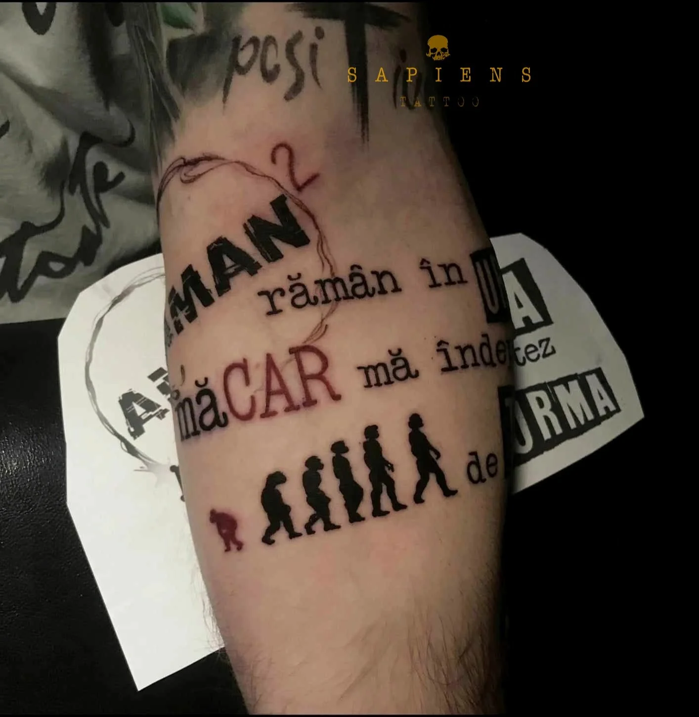 tatuaj pe antebrat cu citat motivational
