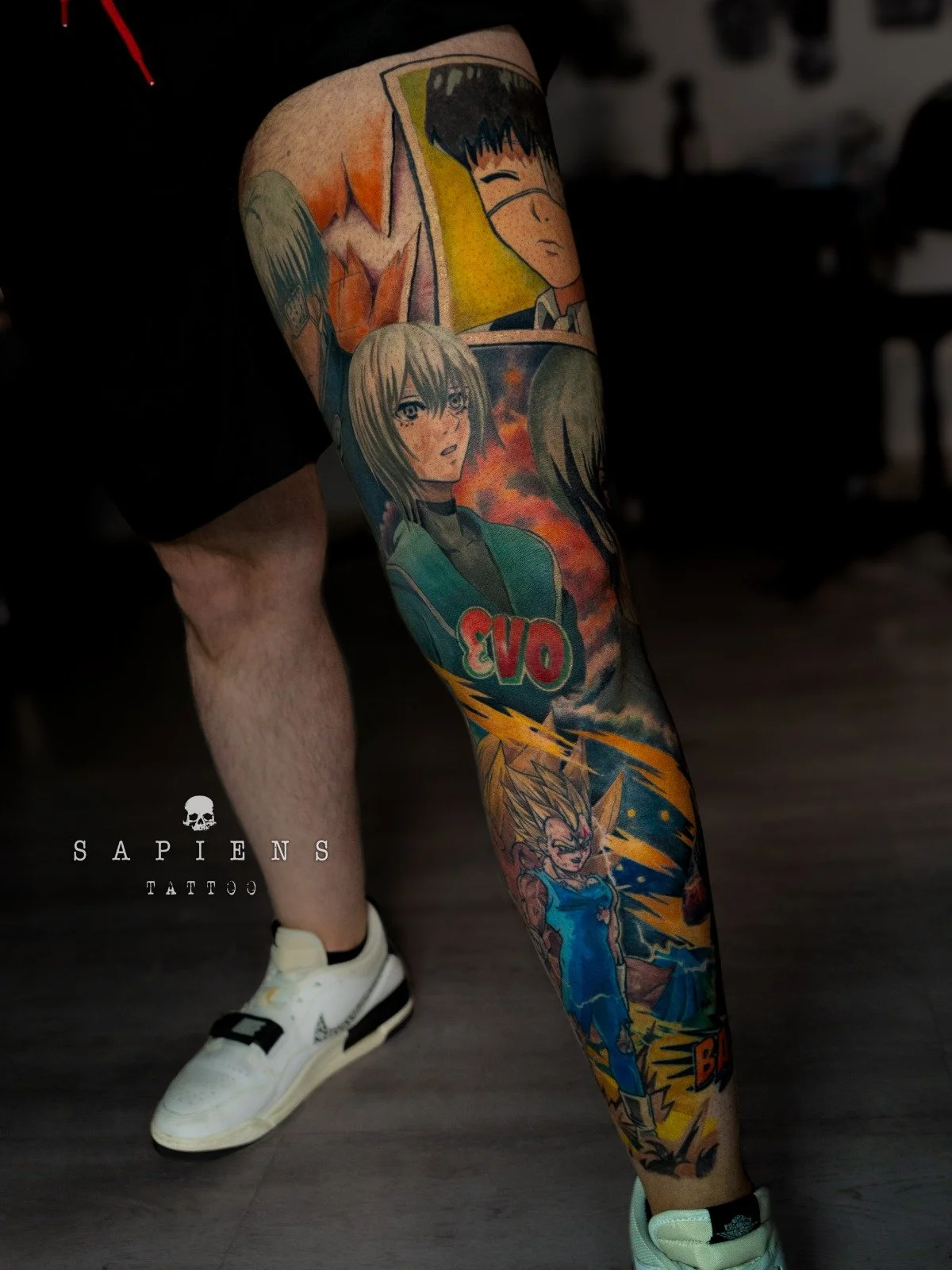 tatuaj color pe tot piciorul inspirat din desenele animate cu naruto shippuden