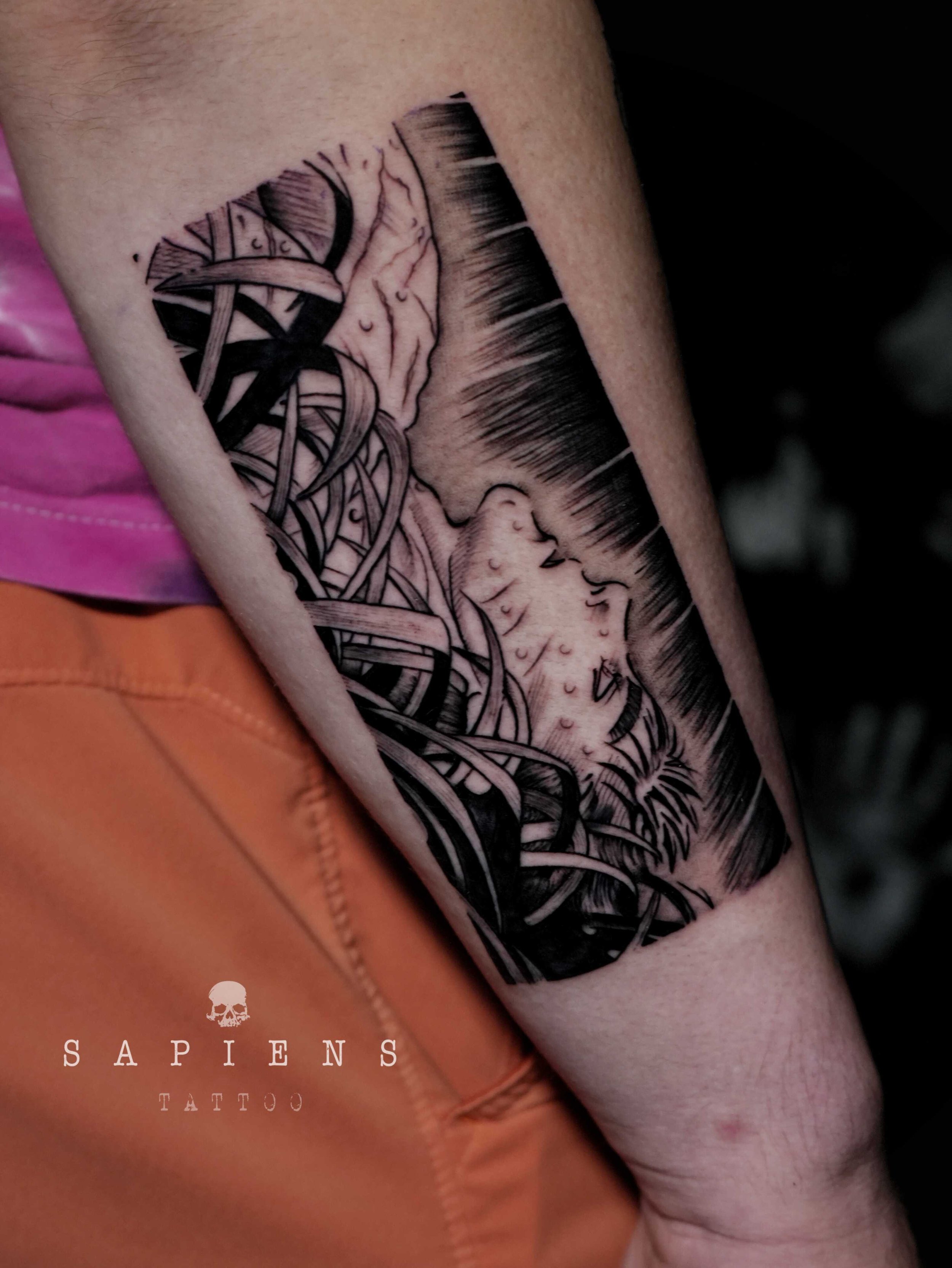 tatuaj cu personajul beresrk din manga