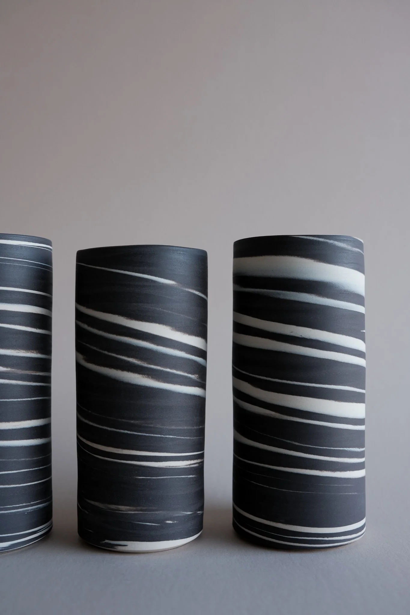 18.5Neriage-cylinder-dark-andrew-gibson-lander-se.jpg
