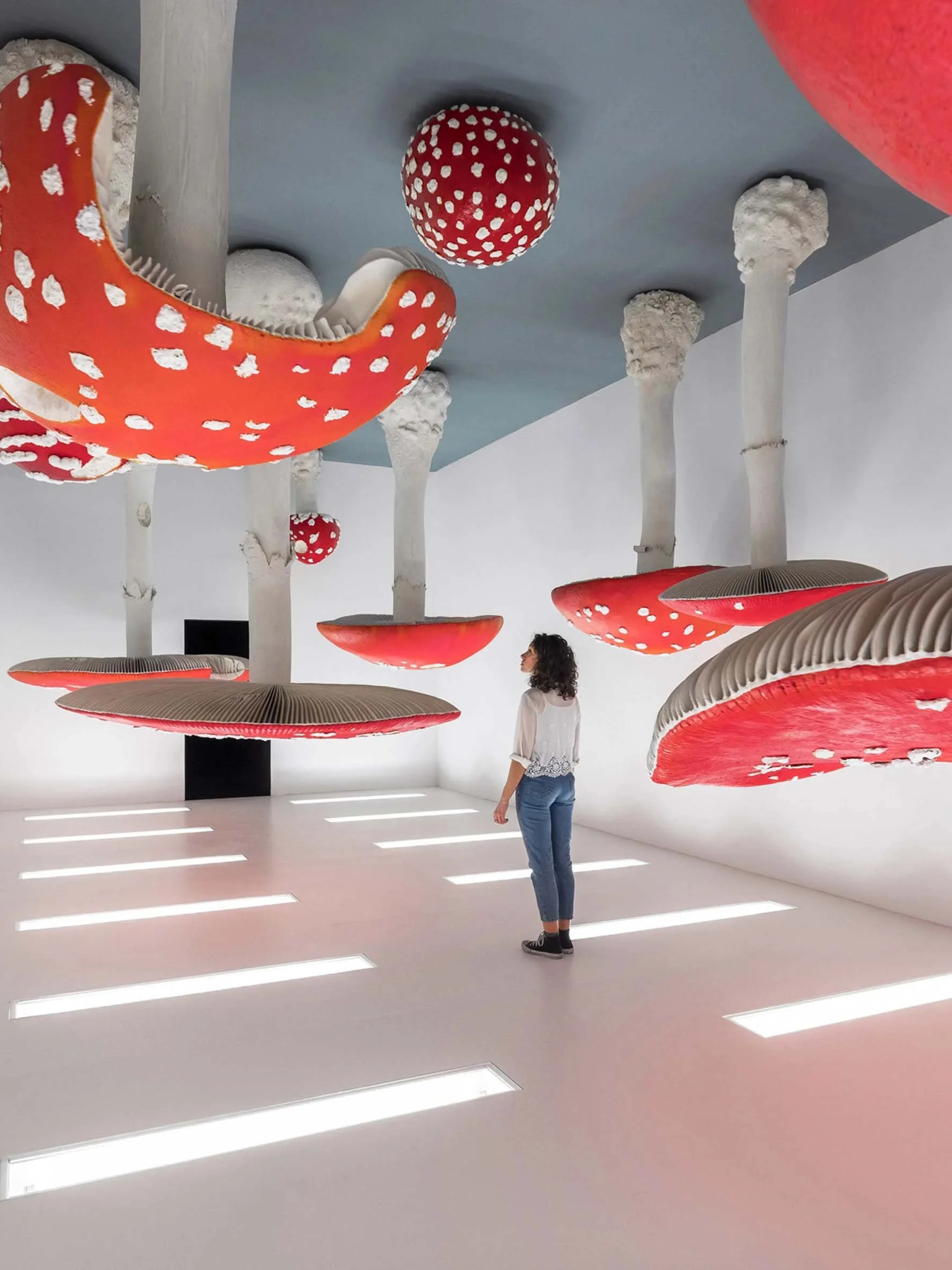   By    OMA       at      Foundazione Prada     , Milan. Yes, these are Fly Agarics.   