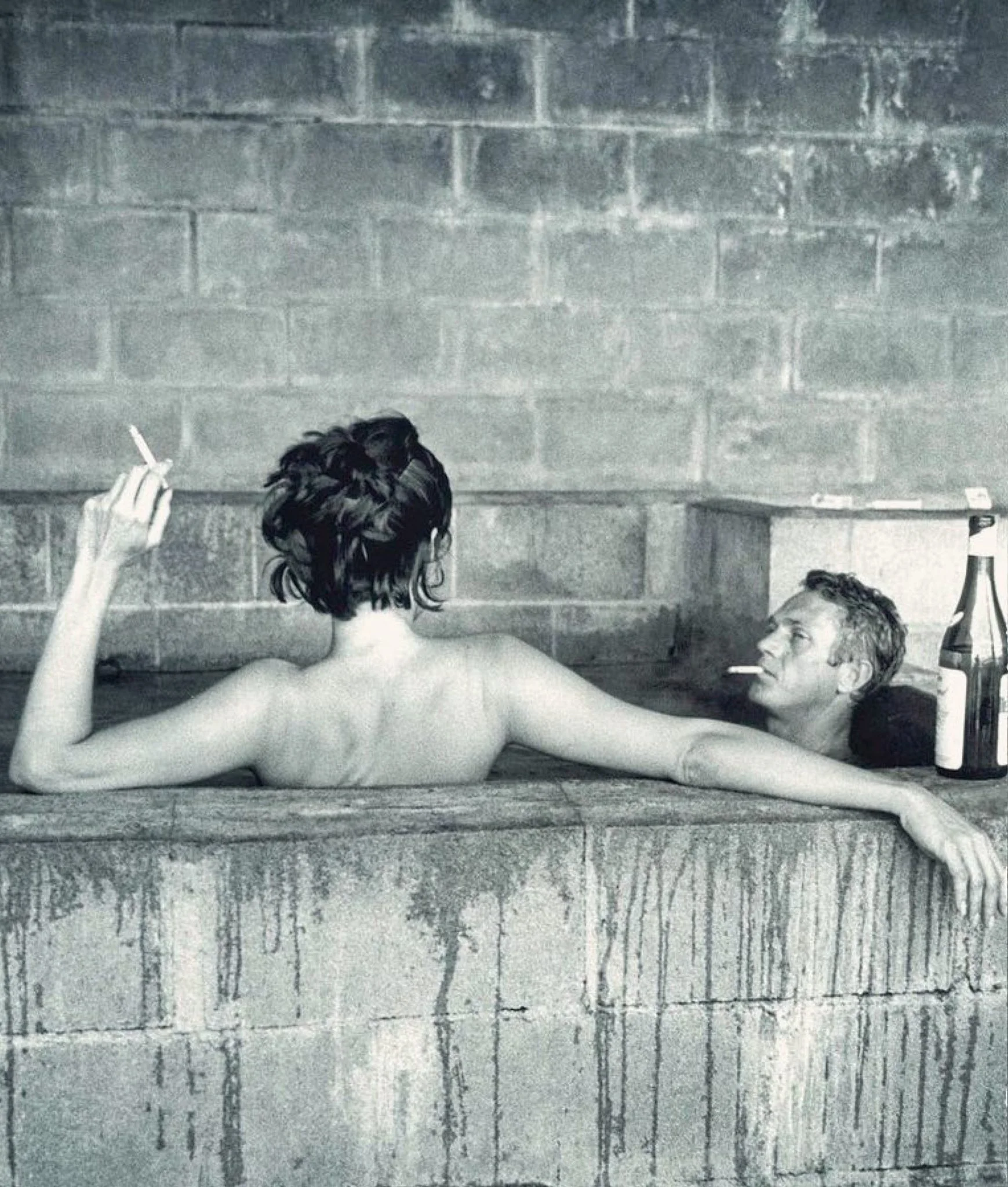   Steve McQueen and Nelie Adams in the steam rooms at Esalen  