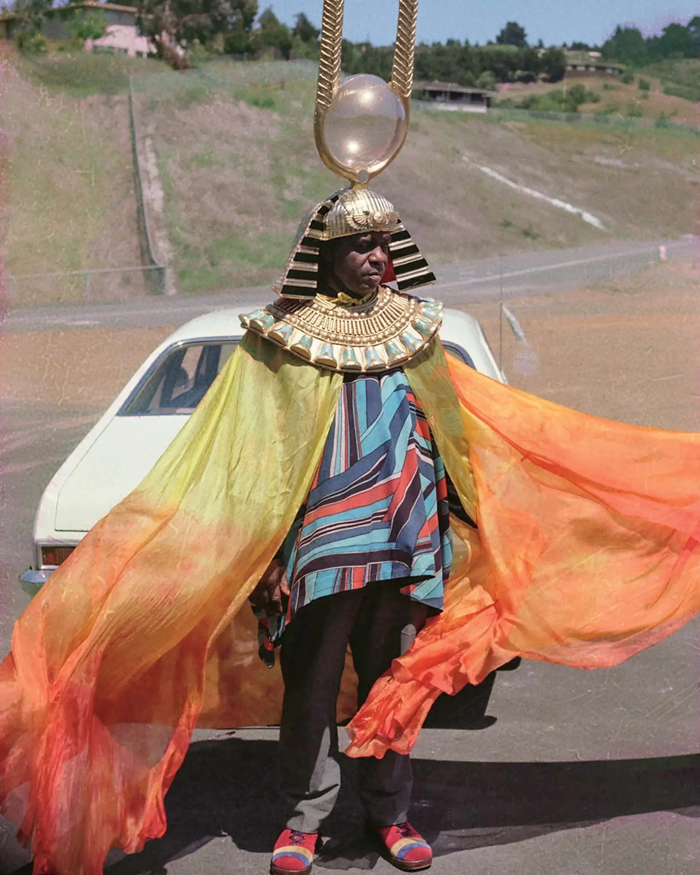   This is jazz musician Sun Ra, definitely don’t turn up for a client’s first session dressed like this. Unless it’s your thing and they totally expect it.   