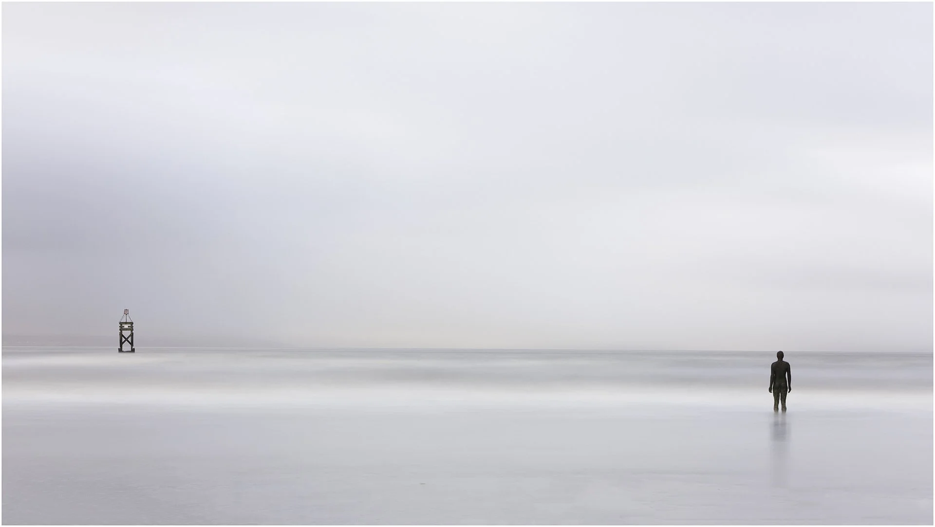 Crosby Beach Man And Marker.jpg