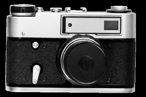 A vintage film camera with a black and silver body and a large lens in the center.