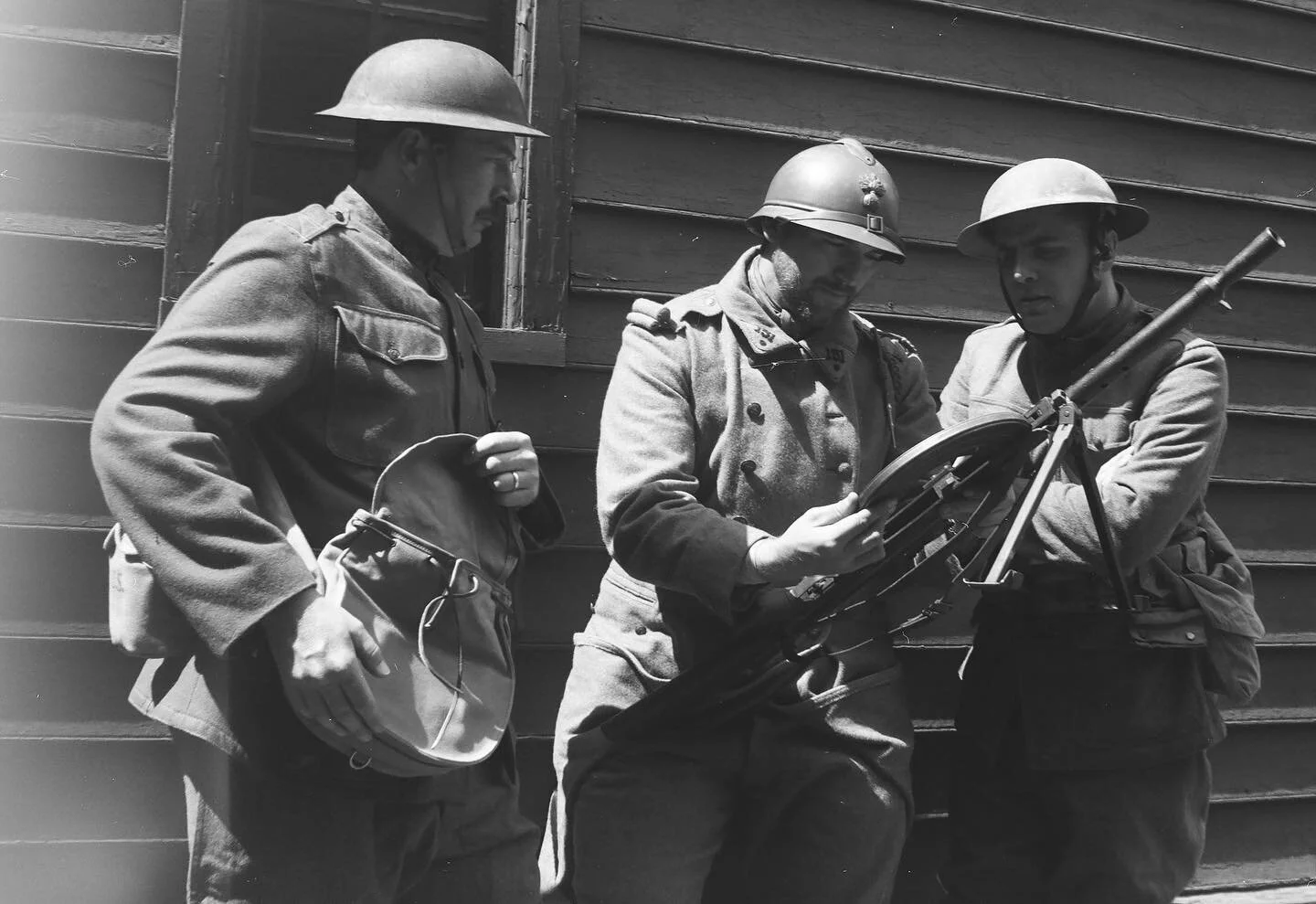 A Poilu demonstrates a Chauchat to two Americans behind the line. I shot this with a Kodak Premo No. 2 and used #ilfordhp5 400 ISO film. With @historyguy1778 @world_wars_model_building @districtcamera @service.photo #reenactmentphotographer #portrait