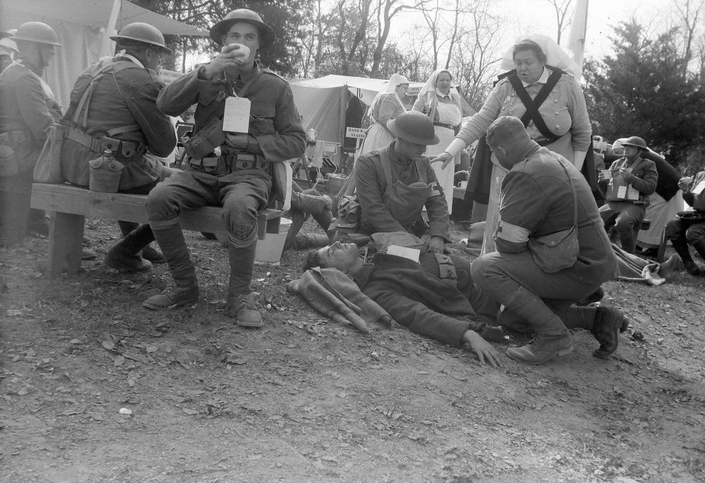 A field hospital behind American lines. A nurse assesses the condition of the wounded with stretcher bearers. I shot this with a Kodak Premo No. 2 and used #ilford 100 ISO film. With @historyguy1778 @districtcamera @service.photo #reenactmentphotogra