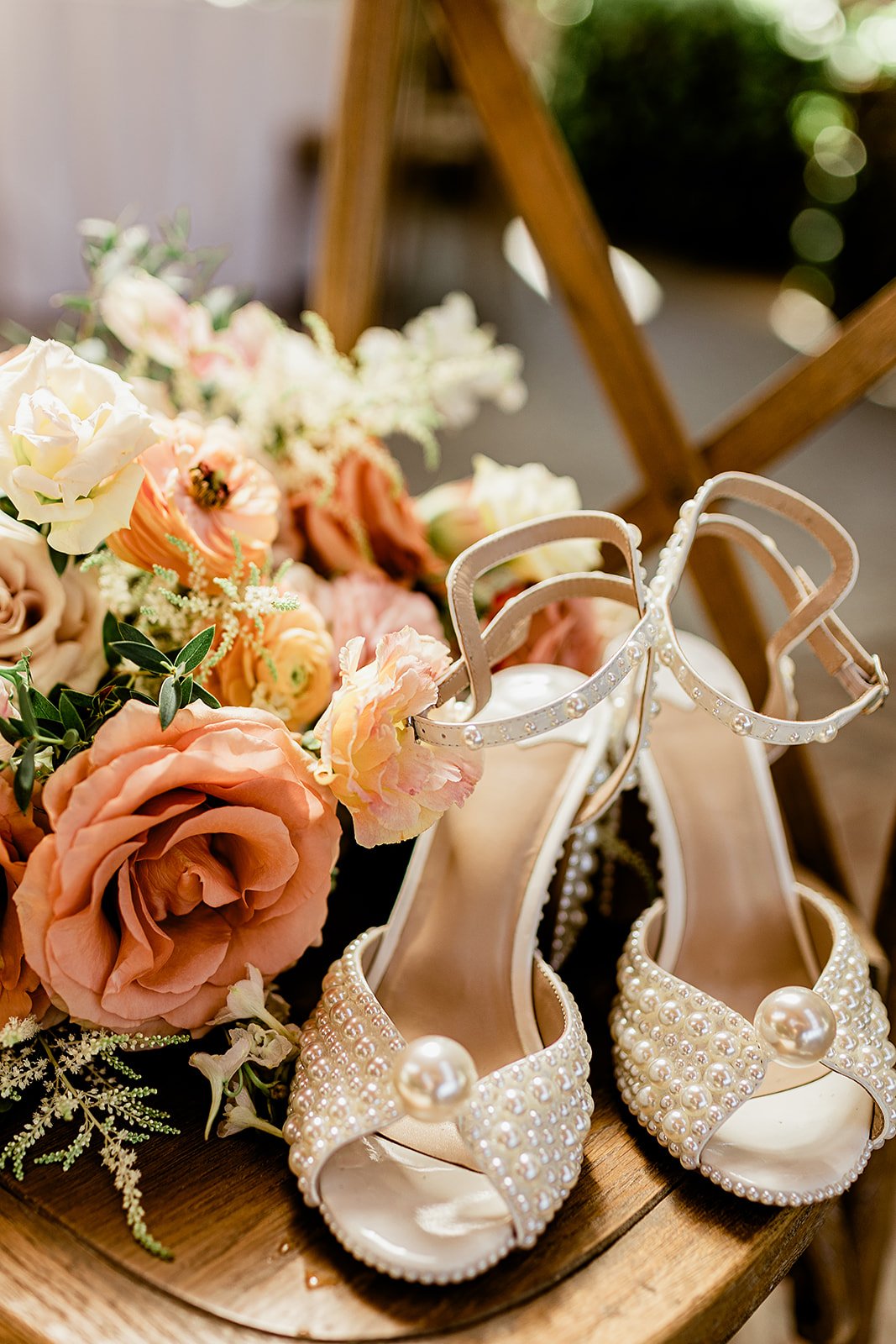 Detail Shot of Bridal Shoes and Florals