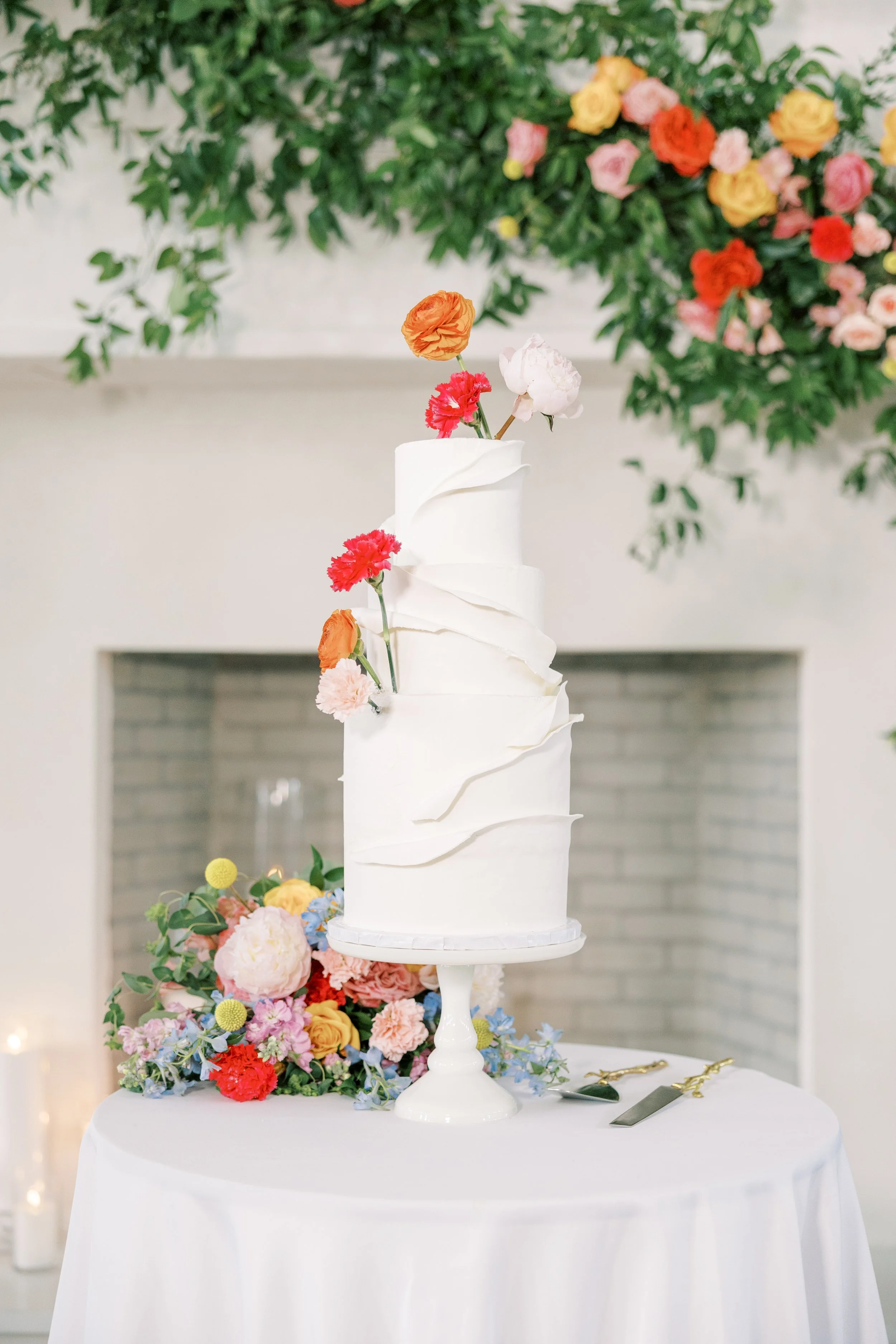 Wedding cake with the floral fireplace installation