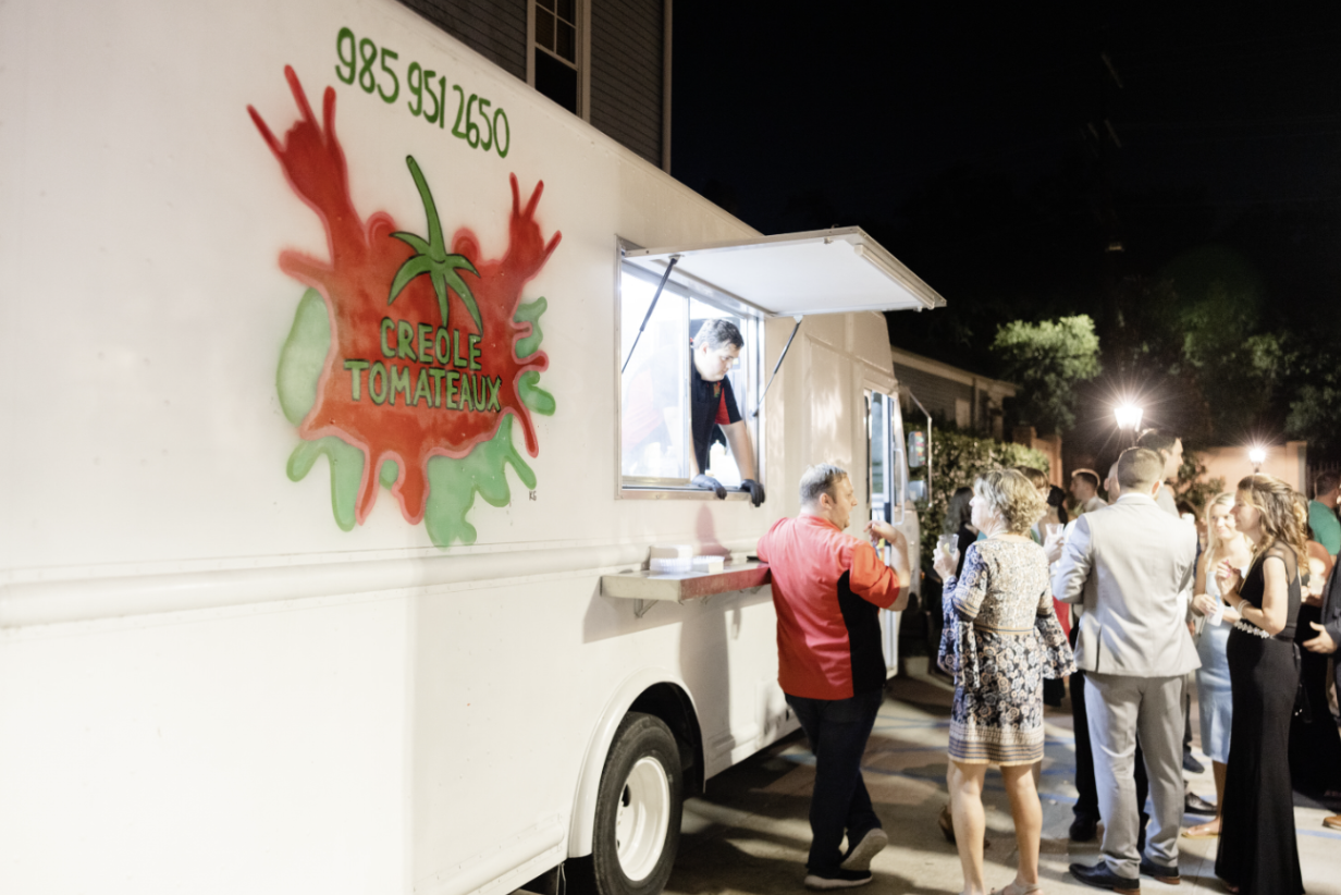 Creole Tomateaux food truck serving guests