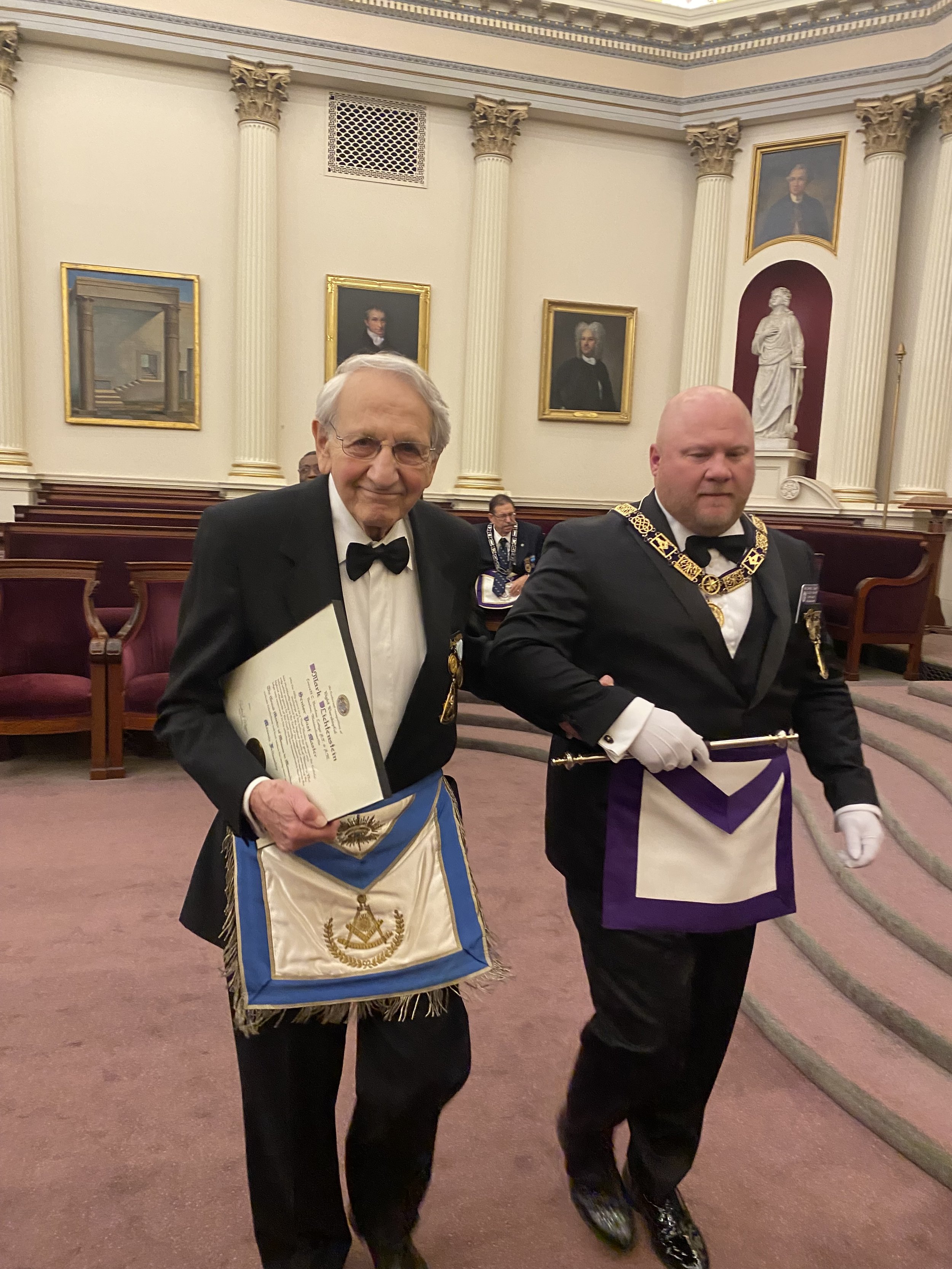  Rt. Wor. Mark Lichtenstein being led around the lodge room to thunderous applause in appreciation of his many years of service. 
